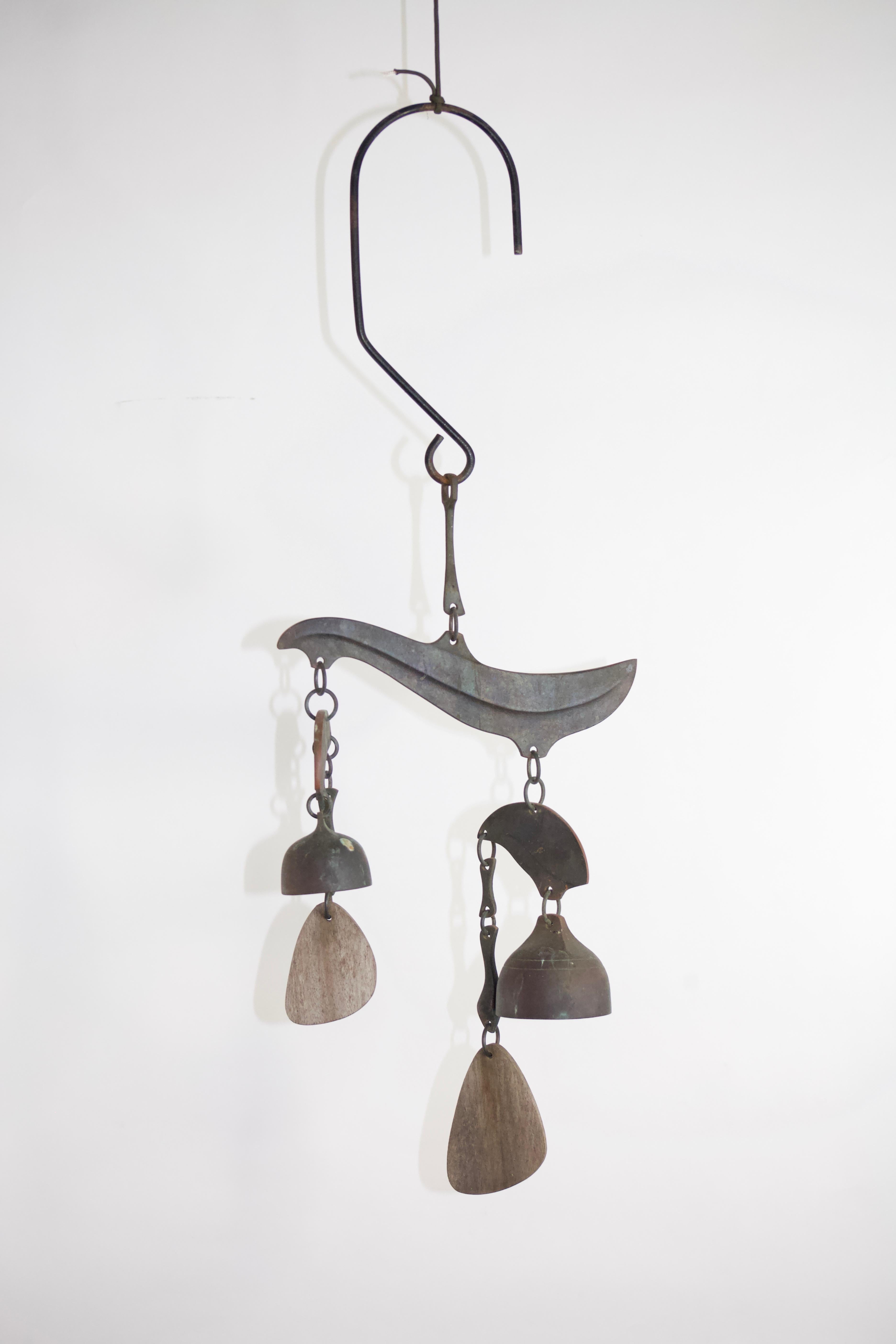 Bronze wind chimes by studio artist Richard Fisher. Beautiful patina and sound. In excellent vintage condition. Signed.