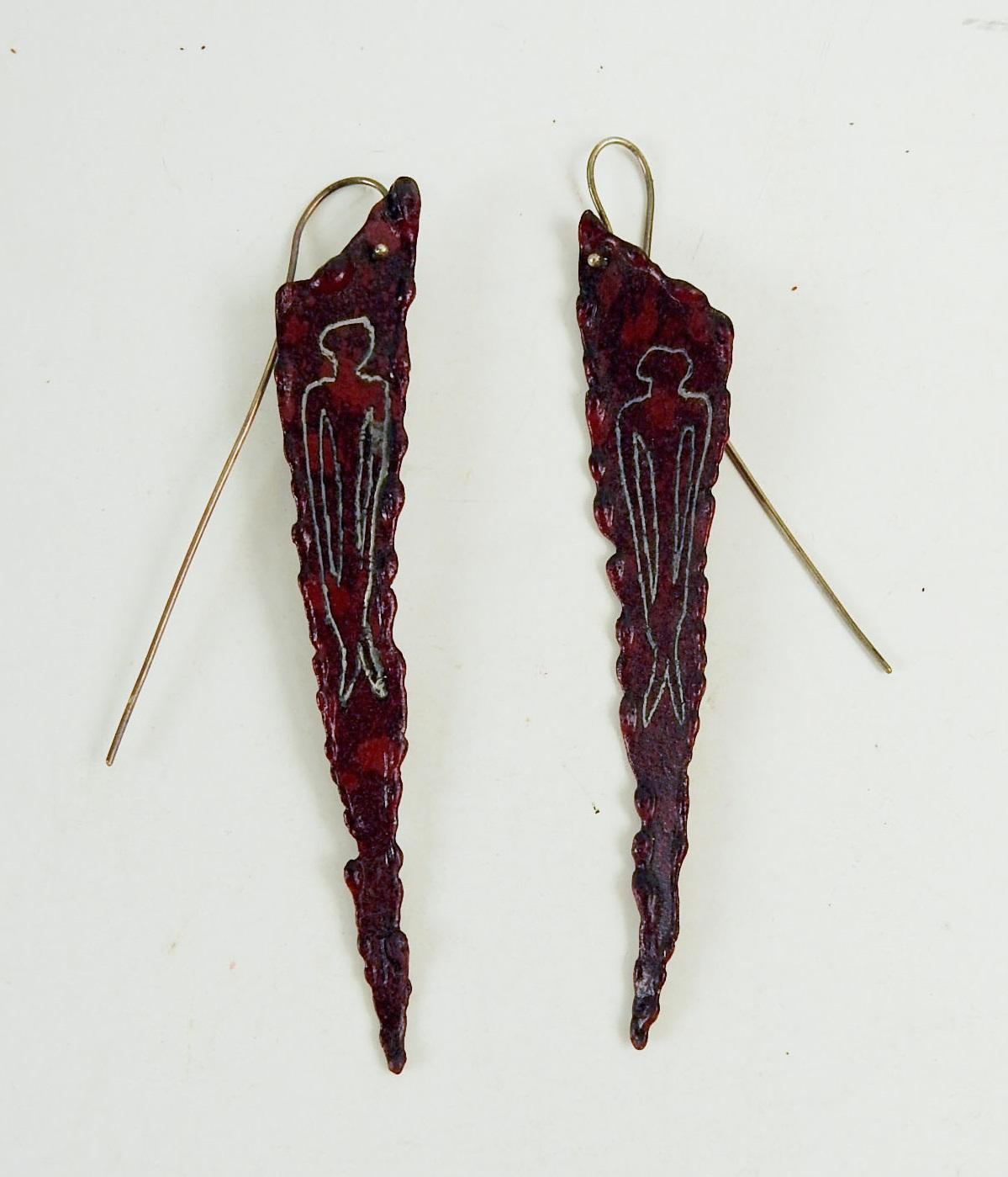 Artist studio made earrings. Painted dark red and black steel with etched figure, long hand made sterling hooks, circa 1990's. Each earring is 3.75