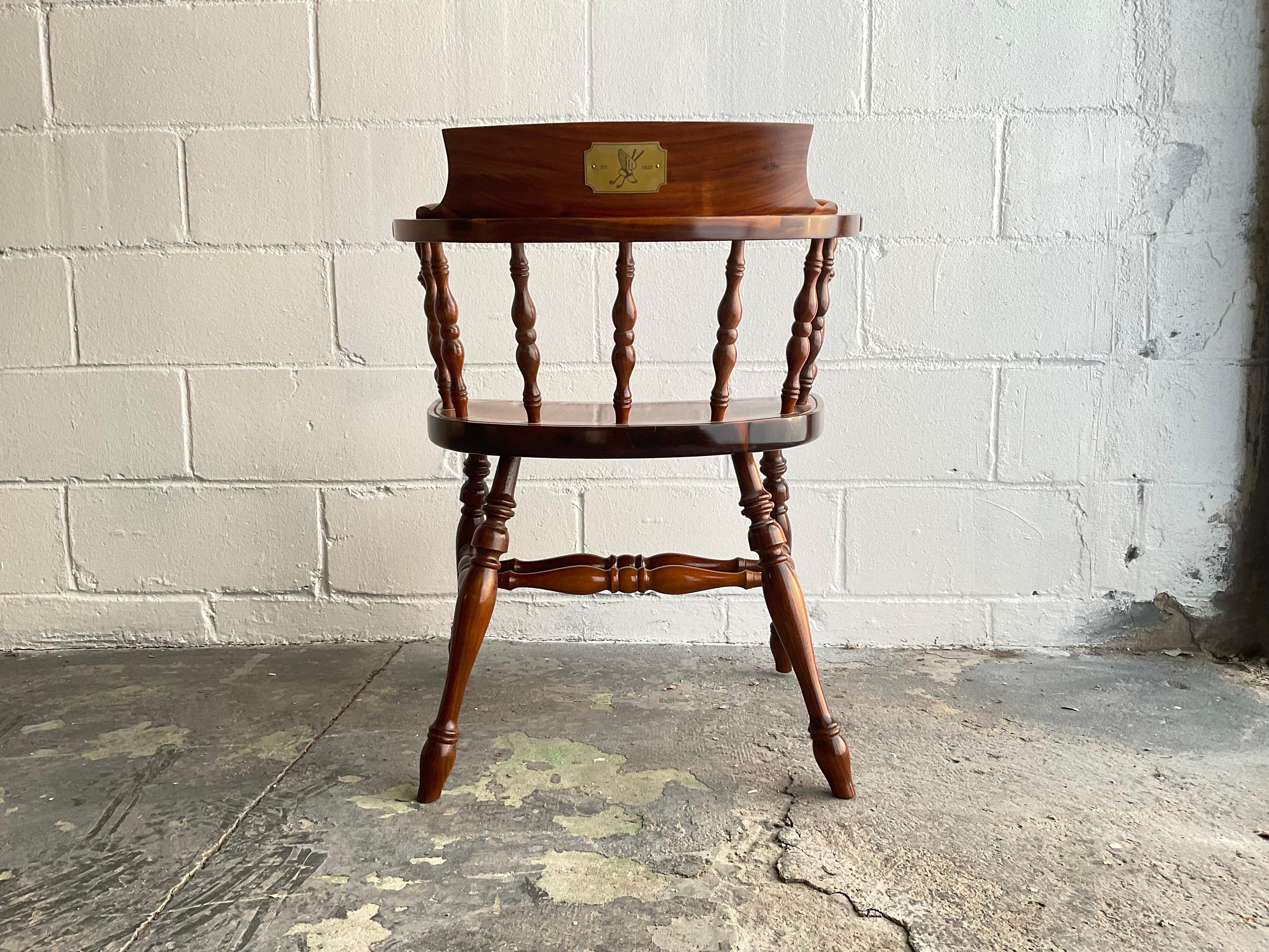 Four remaining examples of a set of 90 handmade solid walnut Windsor captain’s chairs executed for Winged Foot Golf Club ahead of the 2020 U.S Open. The rest of the set is currently in use in the Grille Room at Winged Foot—a storied location in the