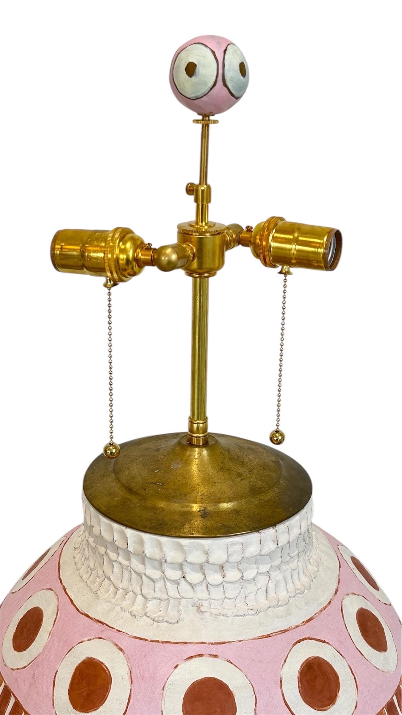 Brass Studio made ceramic lamp in pink, rust and turquoise