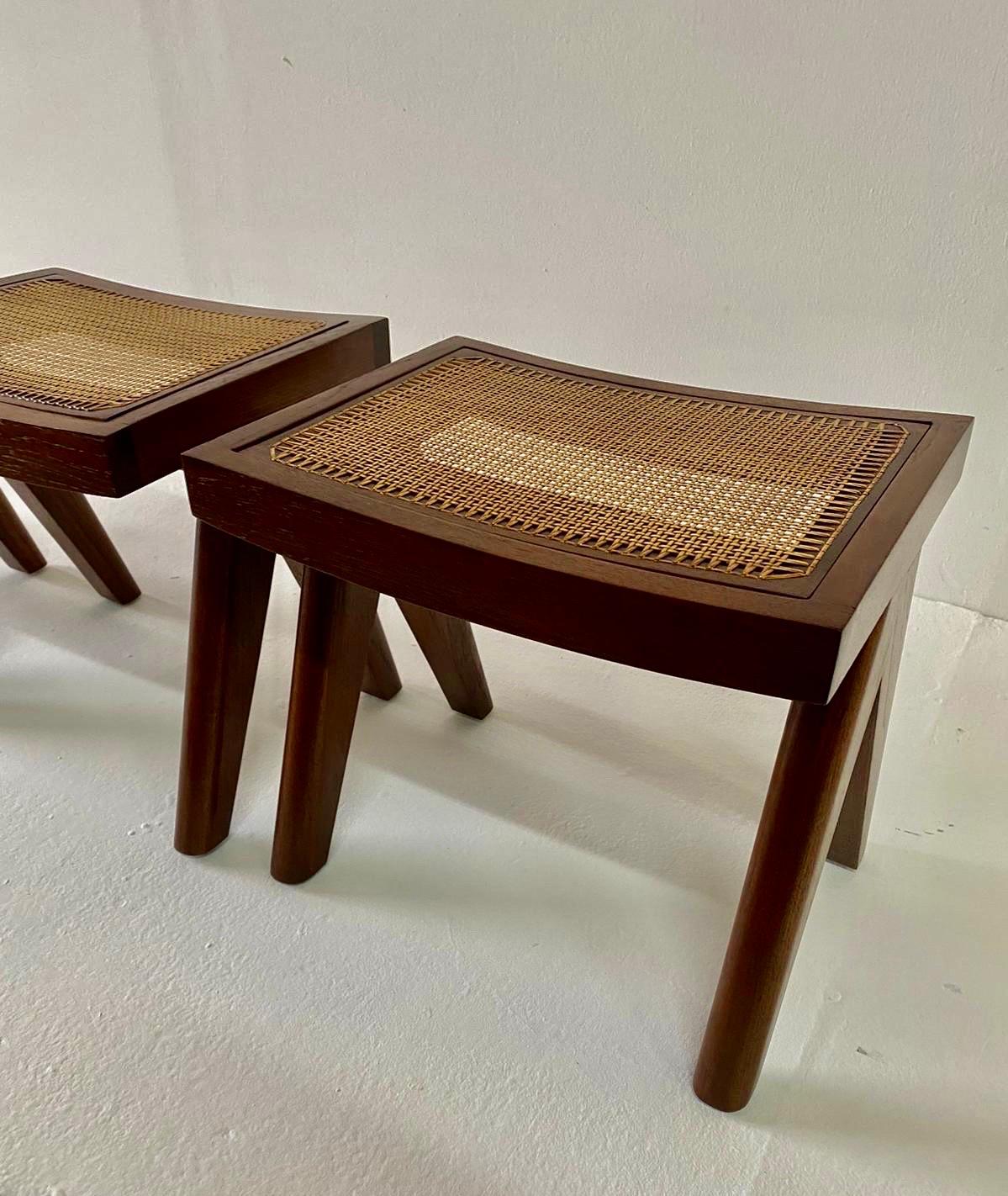Well hand crafted solid teak wood, very well proportioned single stools.  Total of 4 avilable, Sold in Pairs only.  Beautiful water resistant cane seat.  THIS ITEM IS LOCATED AND WILL SHIP FROM OUR MIAMI, FLORIDA SHOWROOM.