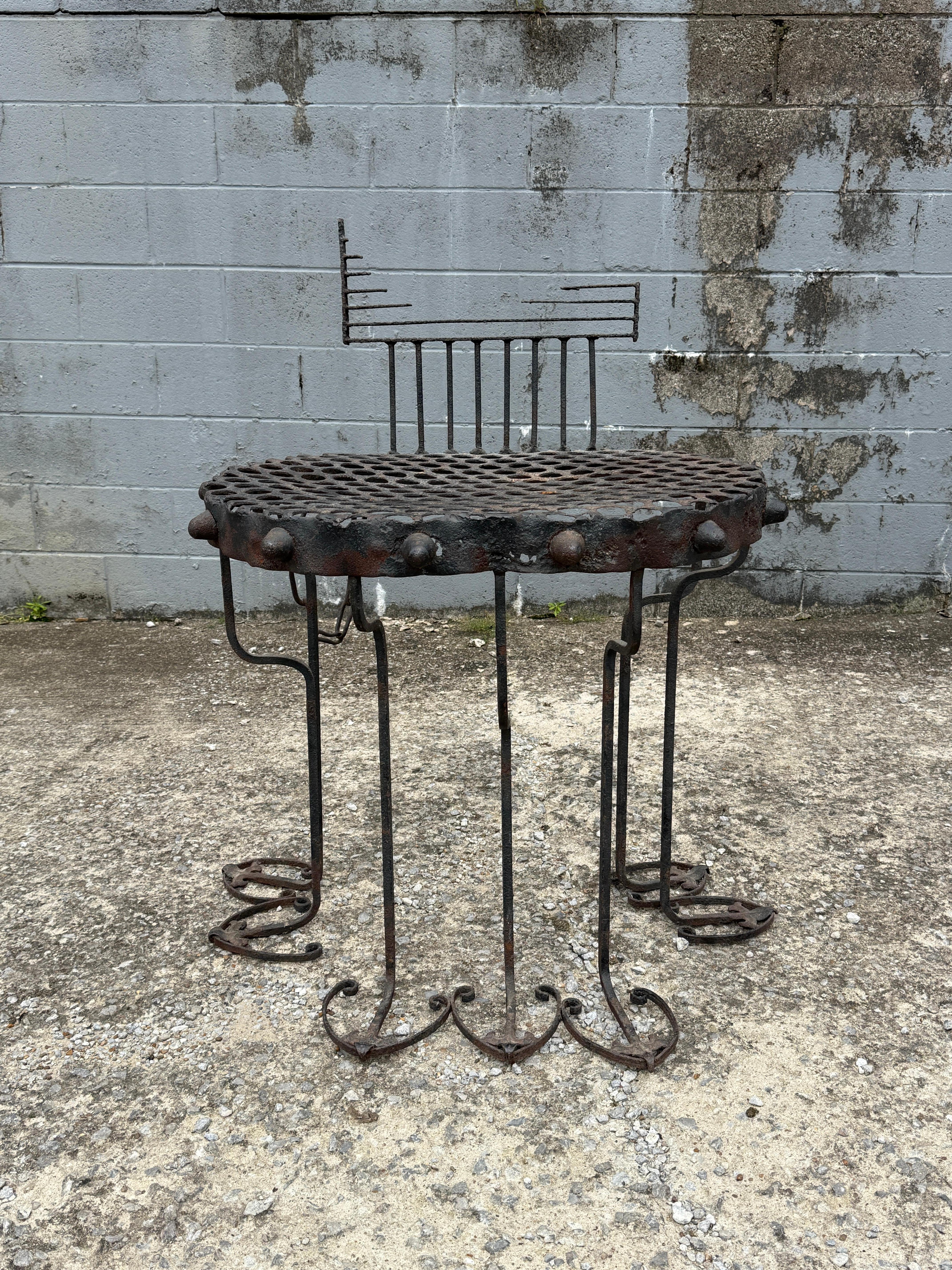 Late 20th century studio-made iron console table. A sturdy piece that would incorporate into a variety of styles. The top surface does dip down slightly in the center. 

Dimensions:
•top width: 31.5”
•top depth: 24”
•floor to top of table-top