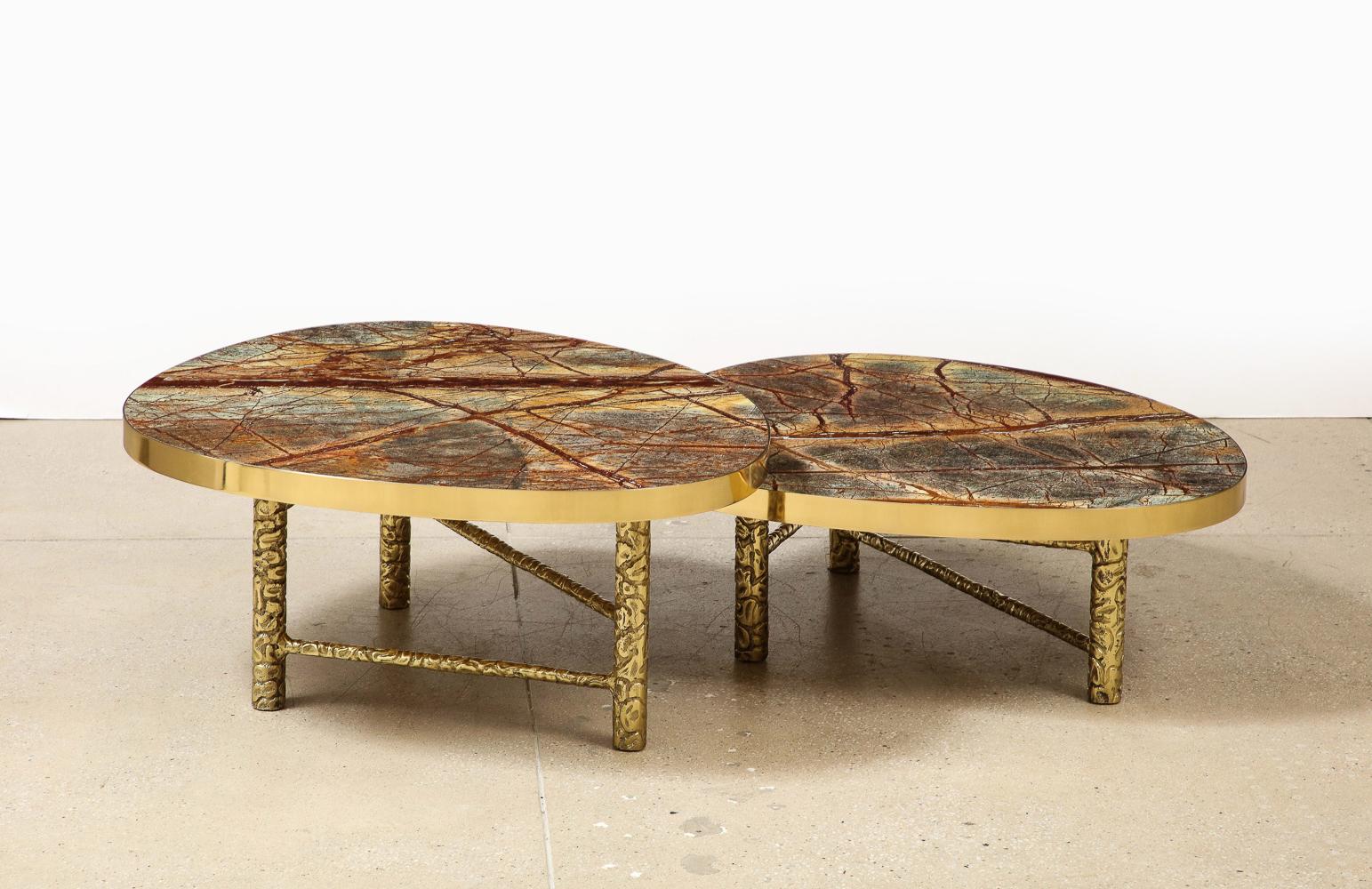 Rainforest marble, textured & polished brass. 2-piece set of nesting tables with 3 legs per table. These can be set in many directions. Made to order with a 15-20 week lead-time. Ask us about our in-stock inventory of Meteoris tables.

h. 1