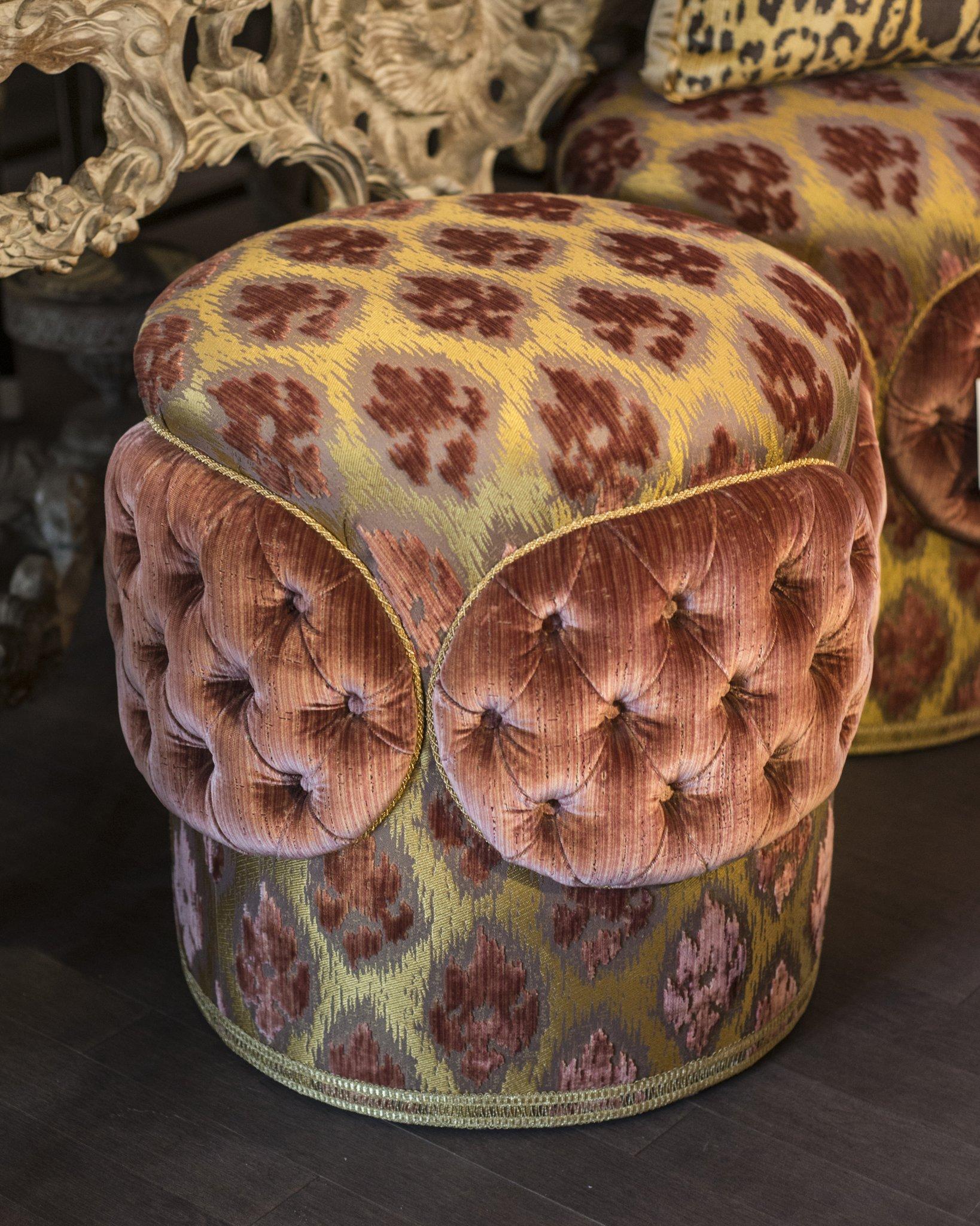 Take a luxurious seat on this pair of Studio Maison Nurita bespoke ottomans. Inspired by the Napoleon III style, each ottoman is upholstered in the most luscious Bevilacqua silk velvet and finished with metallic gold trim. The center panels, thanks