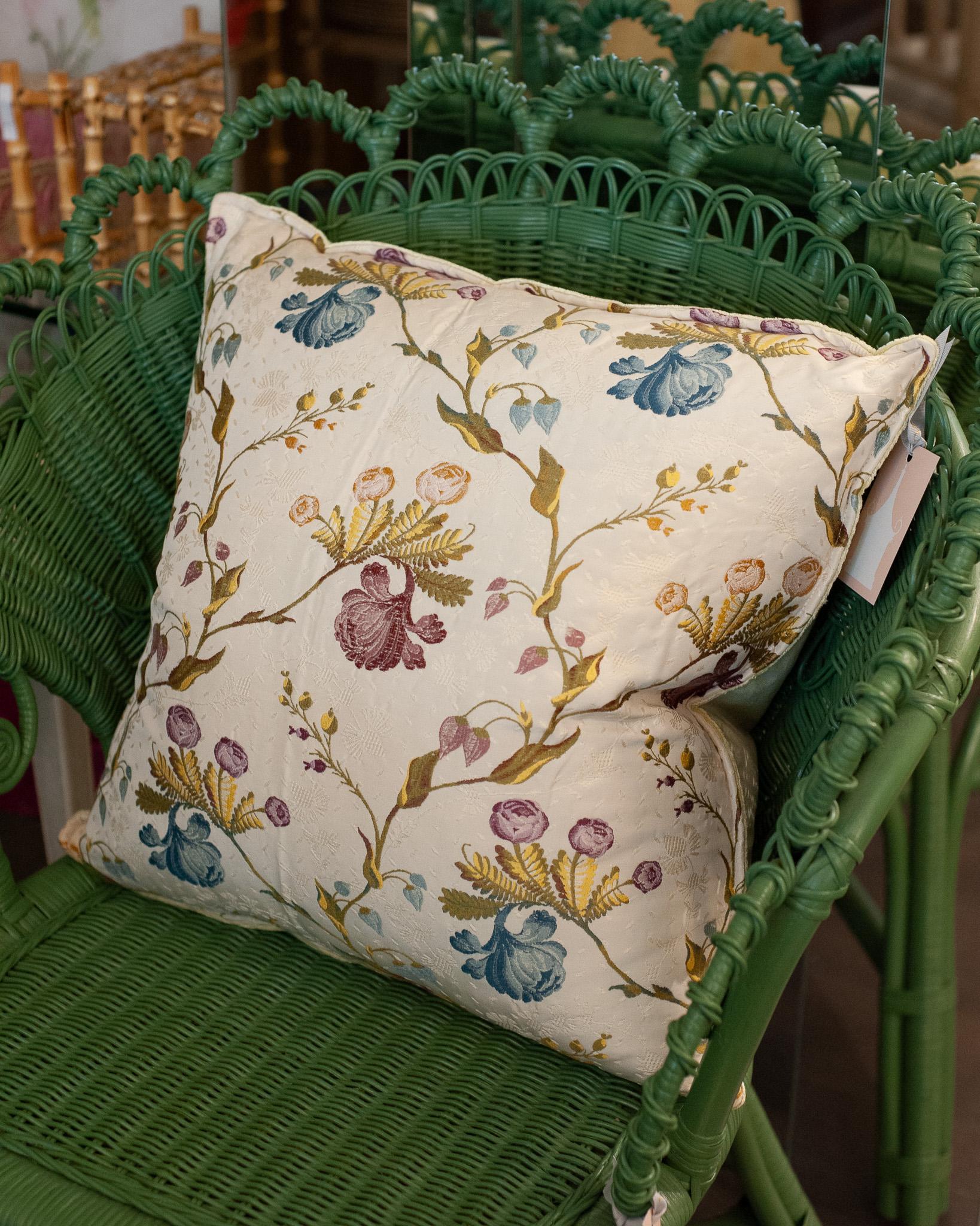 A luxurious Studio Maison Nurita pillow made from a rich cream and multicolour floral brocade, and soft green silk velvet back. This pillow is filled with 80/20 Canadian down and feather for a pillow that feels as beautiful as it looks.
