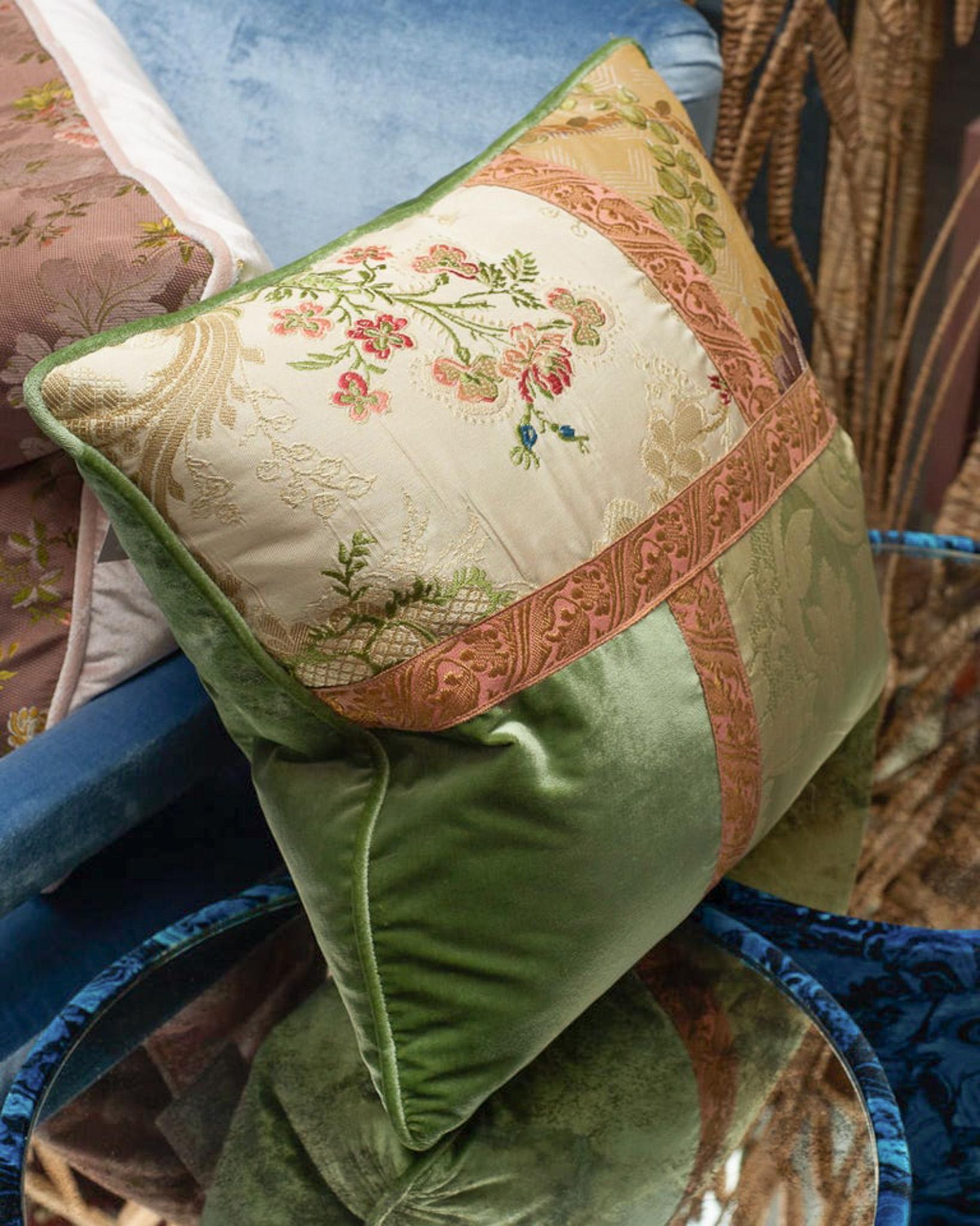 A Studio Maison Nurita handmade patchwork pillow in a variety of green cut pile silk velvets, floral document prints and vintage metallic trims. Filled with Canadian down and feather.