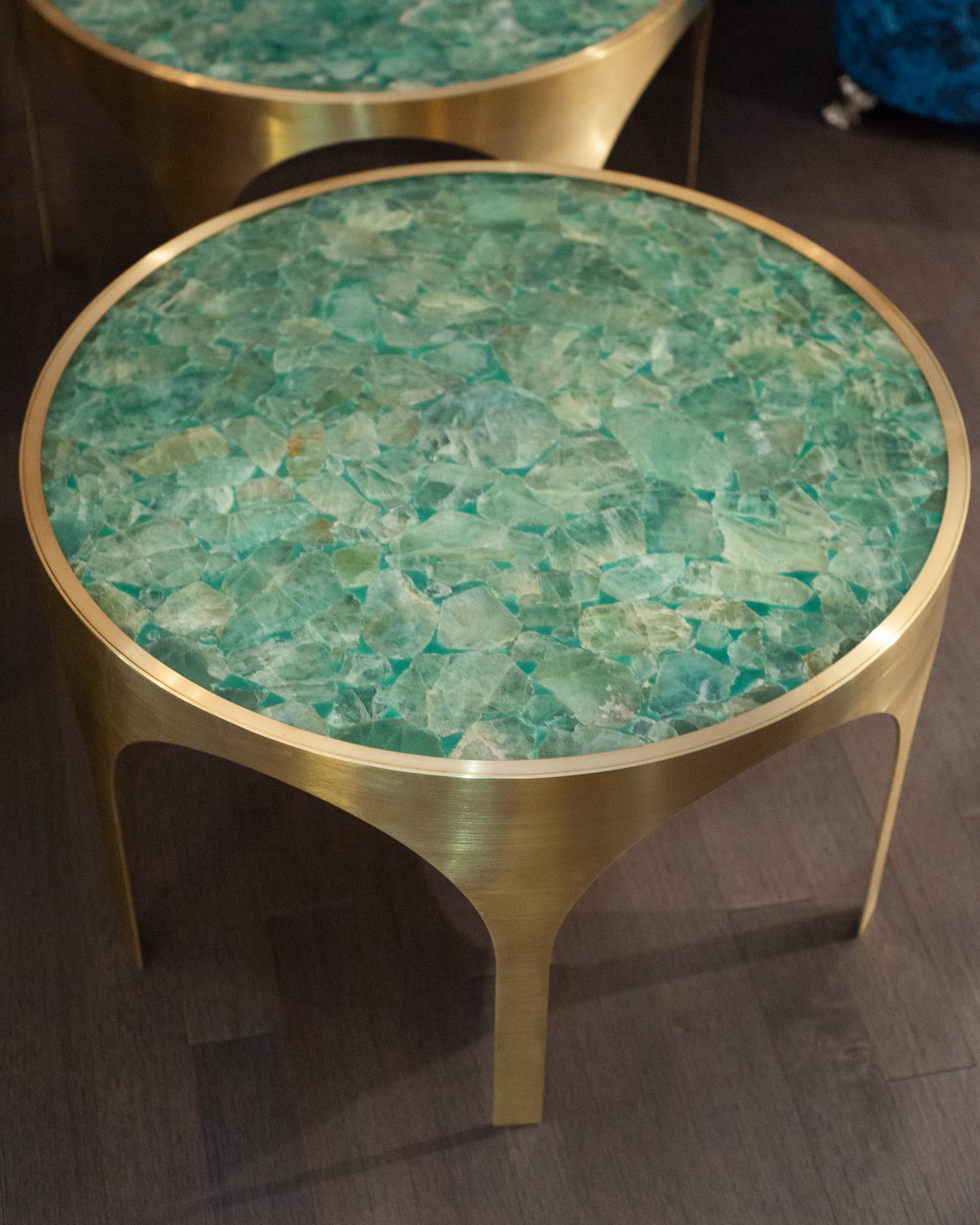 The latest production from Studio Maison Nurita presents a magnificent grand-scale coffee table, a striking fusion of modern design and timeless elegance. The table features a brushed brass arched base, which draws inspiration from the classical