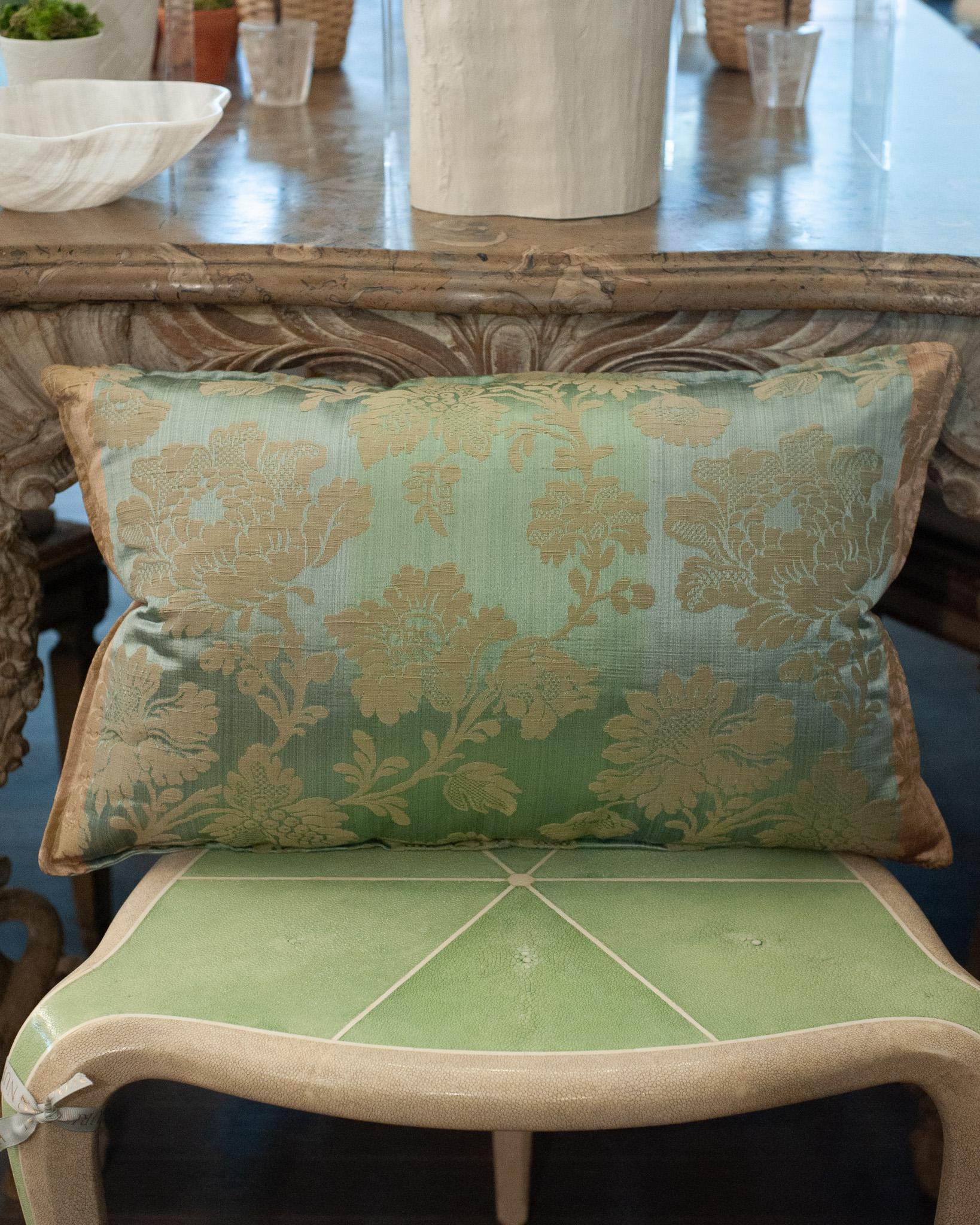 A luxurious Studio Maison Nurita pillow made from a dégradé multicolour floral brocade, and soft blue silk back. This pillow is filled with 80/20 Canadian down and feather for a pillow that feels as beautiful as it looks.
