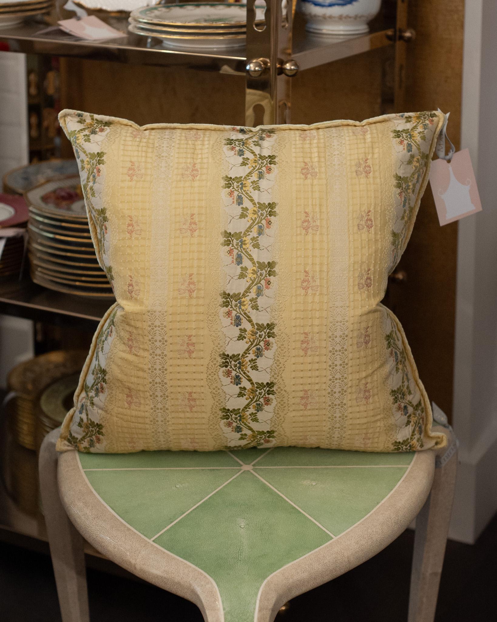 A luxurious Studio Maison Nurita pillow made from a soft yellow document print floral brocade, and a soft green silk velvet back. This pillow is filled with 80/20 Canadian down and feather for a pillow that feels as beautiful as it looks.
