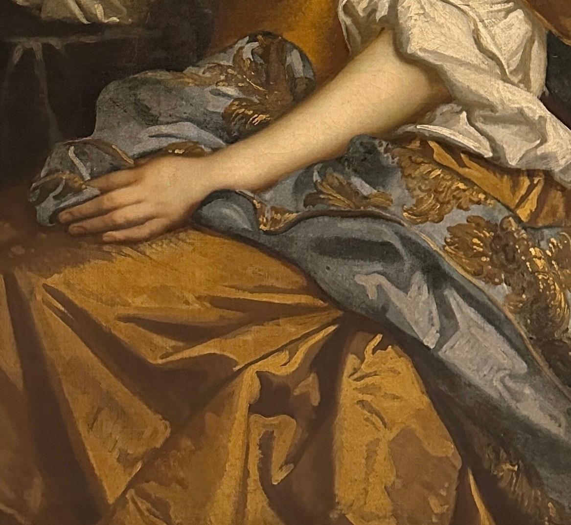 Porträt einer Dame, vermutlich Henrietta Hyde (geb. Boyle), Gräfin von Rochester, (1646-1687), dreiviertel lang, in einem bernsteinfarbenen Seidenkleid und einem bestickten blauen Mantel, in einem Innenraum sitzend.

Öl auf Leinwand in einem