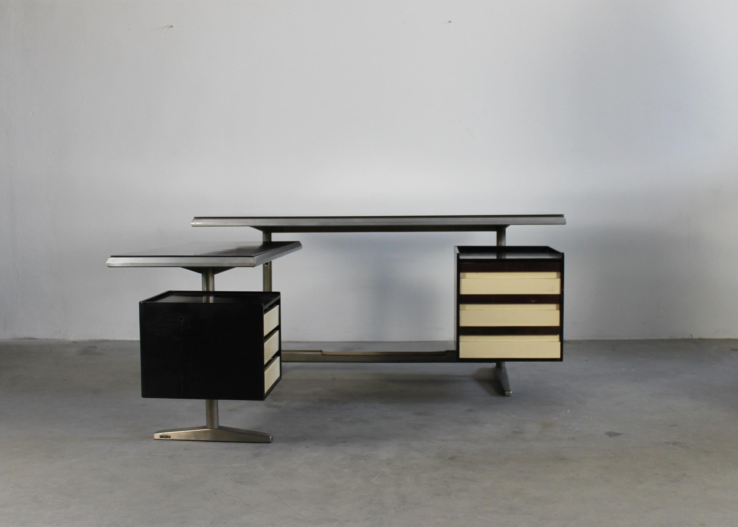Unique angular writing desk with two tops and some lateral drawers (three for each side) with structure in lacquered metal and wood, designed by Studio Rosselli Ponti Fornaroli and Produced by Rima, Padova 1965.

The manufacturer's brand engraved
