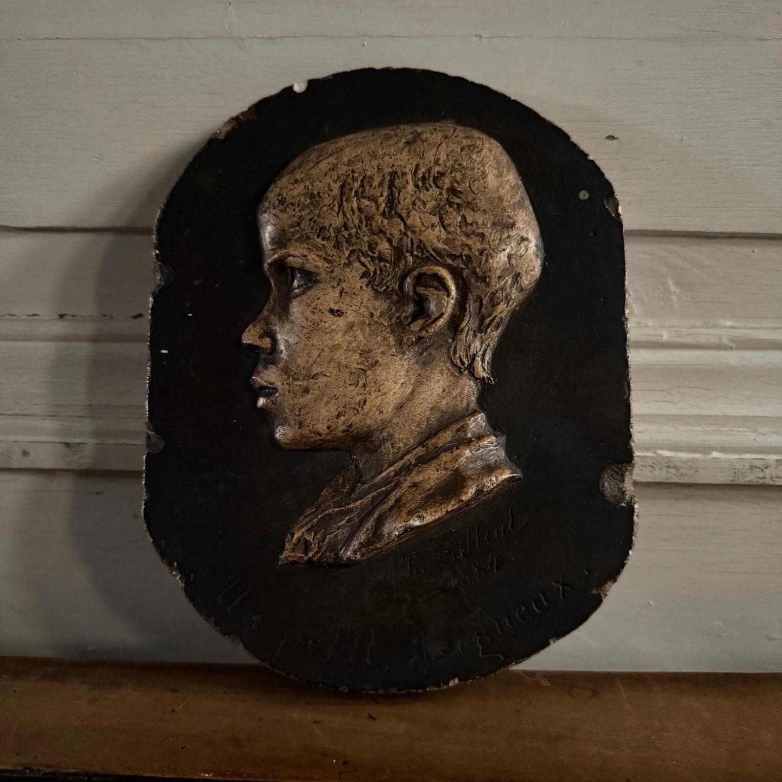 20th Century Studio plaster by Charles Filleul, child's profile, A Little Rascal. For Sale
