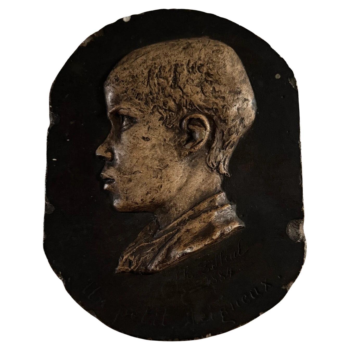 Studio plaster by Charles Filleul, child's profile, A Little Rascal.
