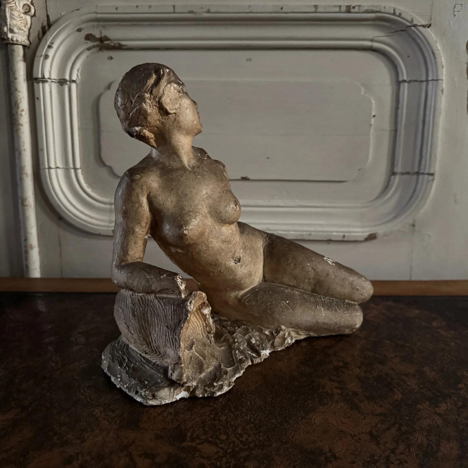 Neoclassical Studio plaster by Charles Filleul depicting a nude young woman seated on a rock. For Sale