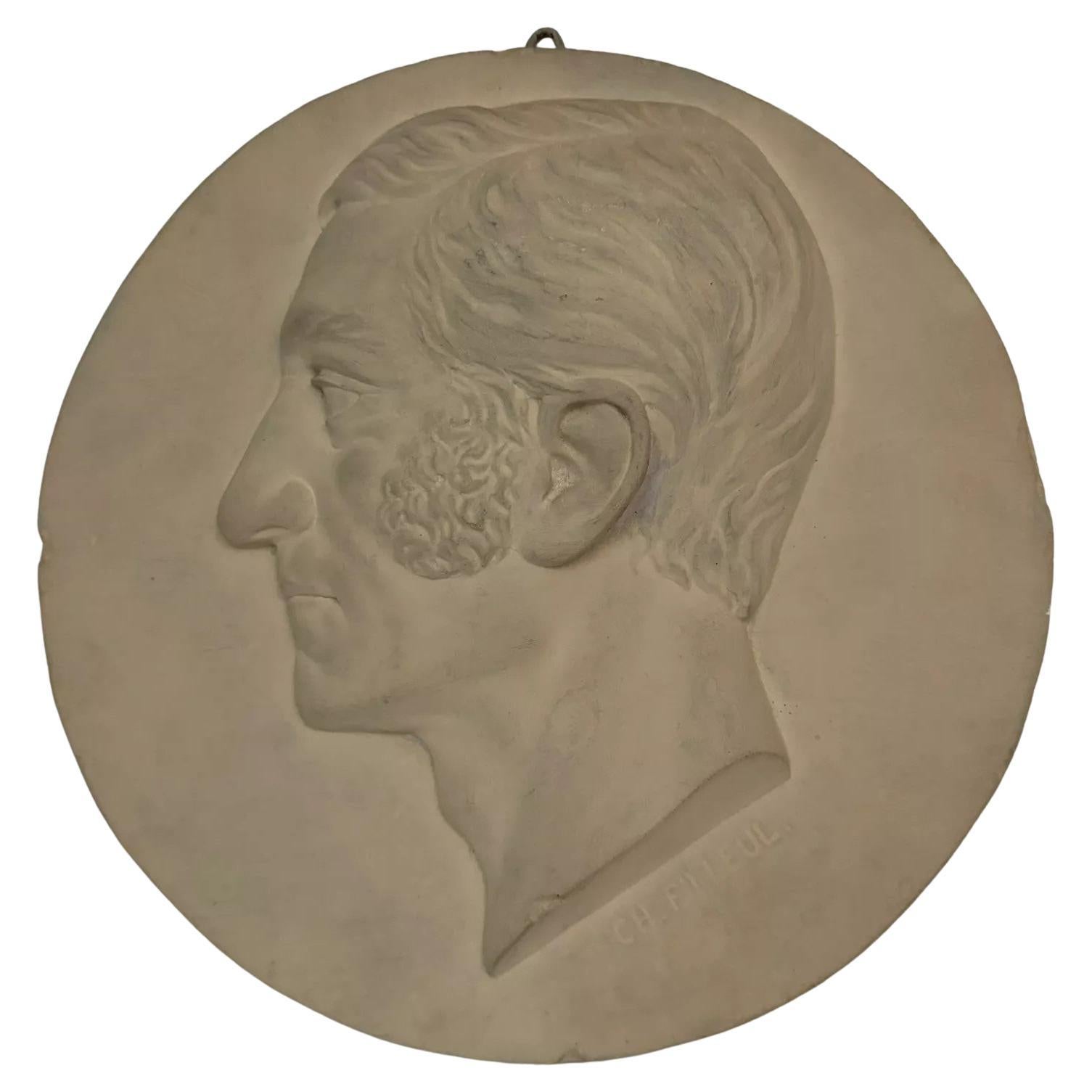 Studio plaster by Charles Filleul – Profile of a man with sideburns.