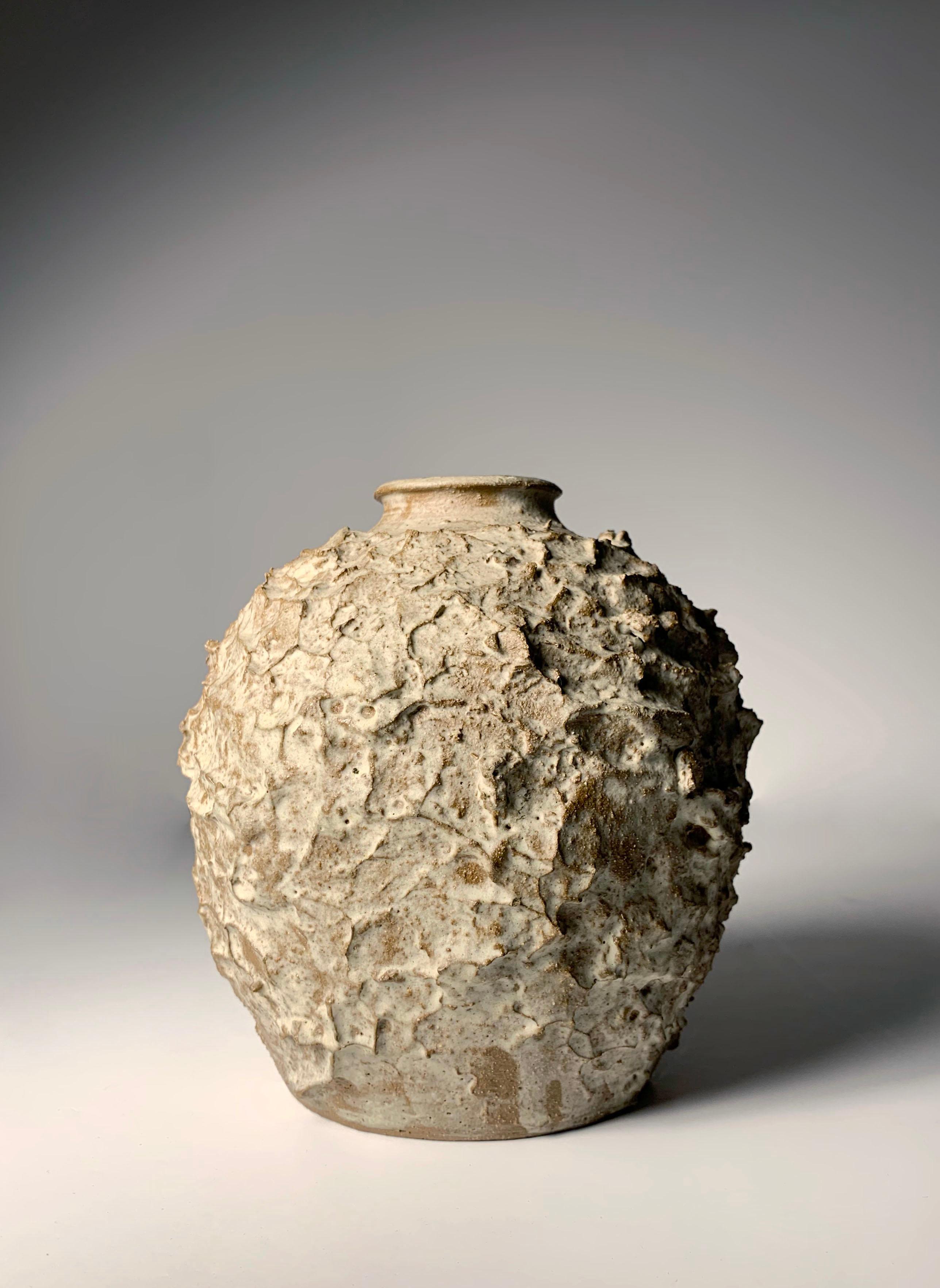 Nice Petite Textured Studio Pottery vase by Peg Tootelian.
A studio handbuilt piece. The neck/top is intentionally left uneven.

Illinois artist PegTootelian apprenticed with Edna Arnow in the 1950s and exhibited at the Syracuse Ceramic Nationals in