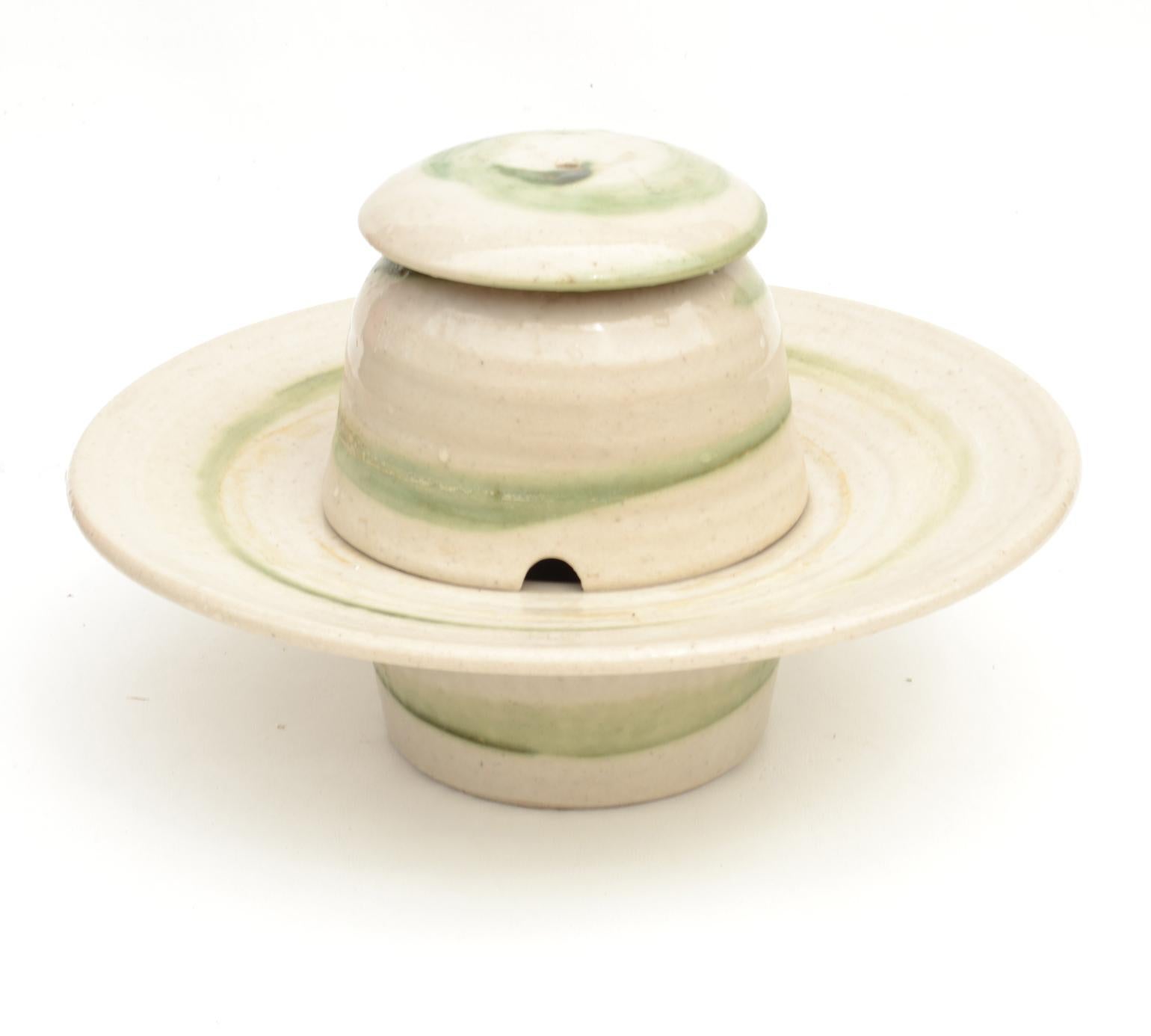 Fountain with two different tops of choice for a low or medium height feature (Height 16 or 26 cm. It is suitable for indoors as a table feature like in a spa or relaxing area or outdoors in a garden. The studio pottery fountain in tree part, is