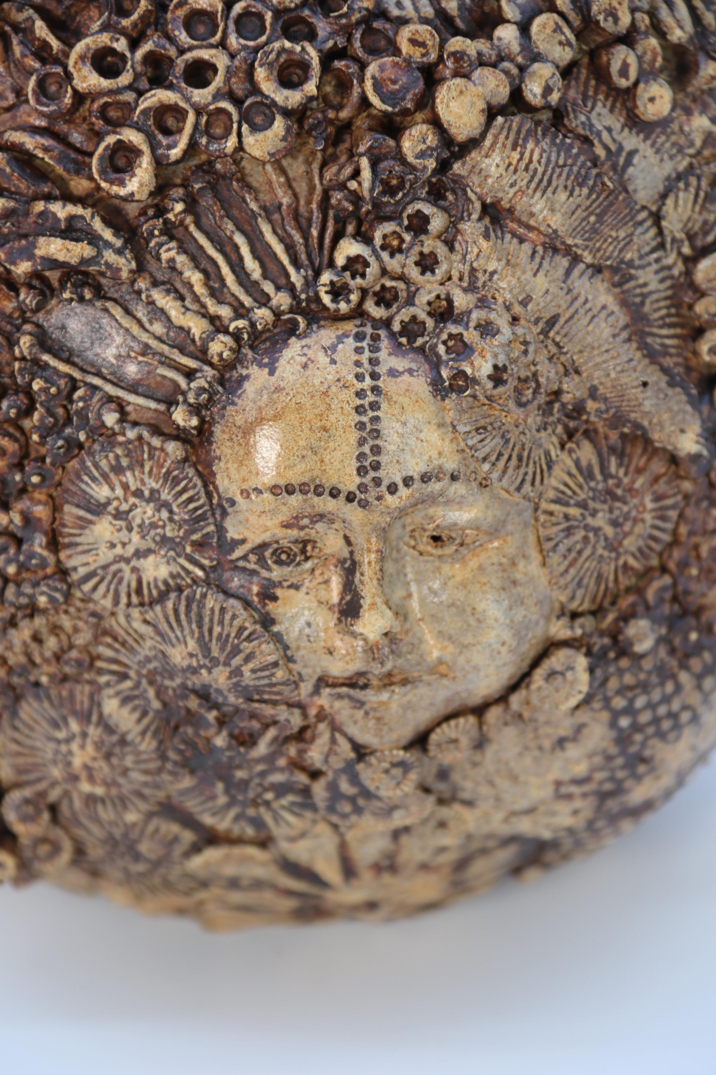 Studio pottery hand created mythical sculpture of the many faces of sea urchins 2