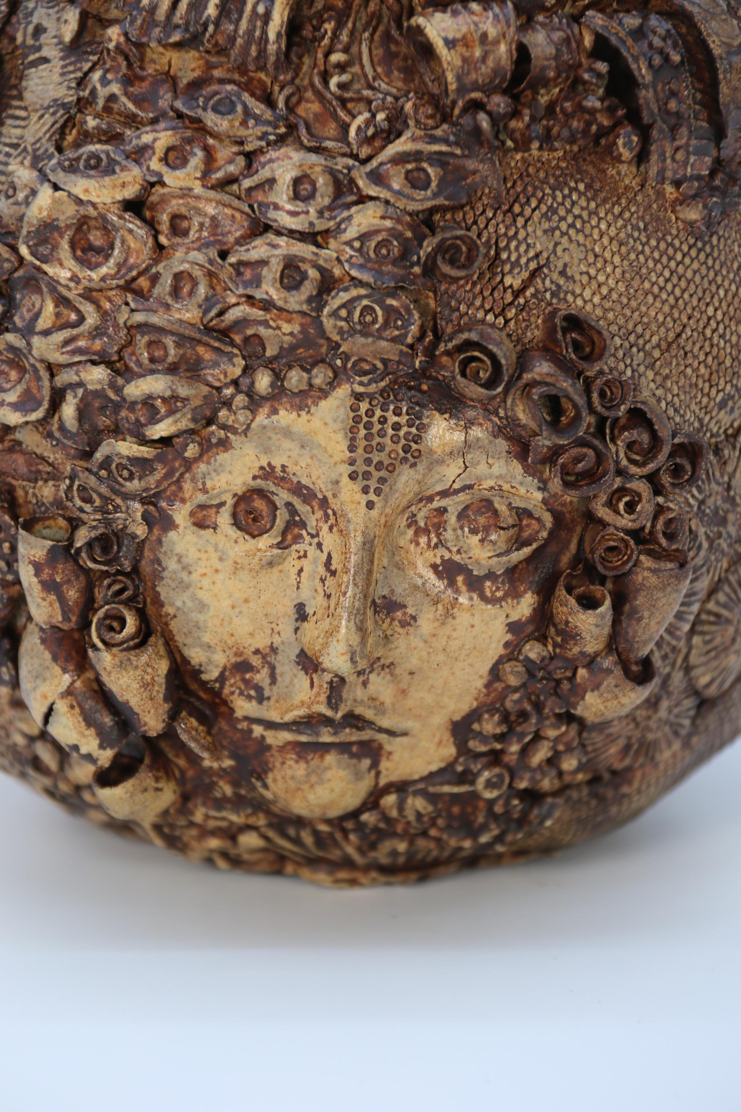 Studio pottery hand created mythical sculpture of the many faces of sea urchins 3
