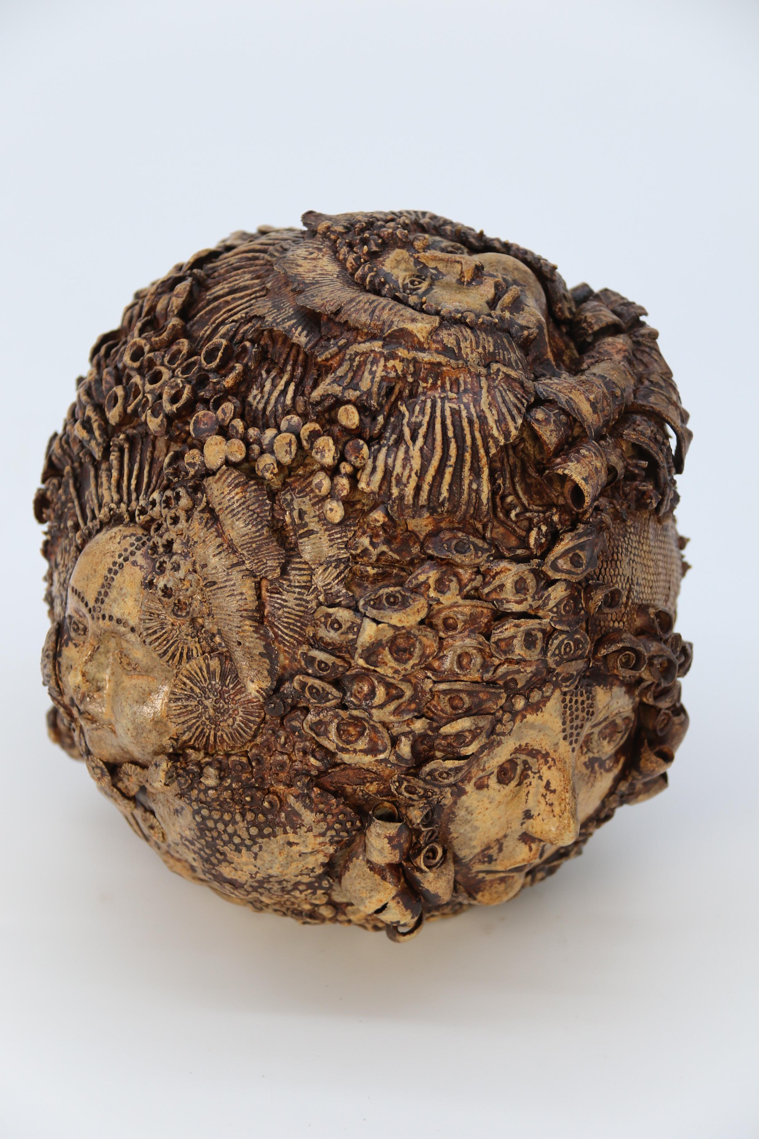 Studio pottery hand created mythical sculpture of the many faces of sea urchins 11