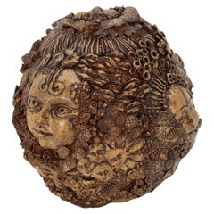 Studio pottery hand created mythical sculpture of the many faces of sea urchins