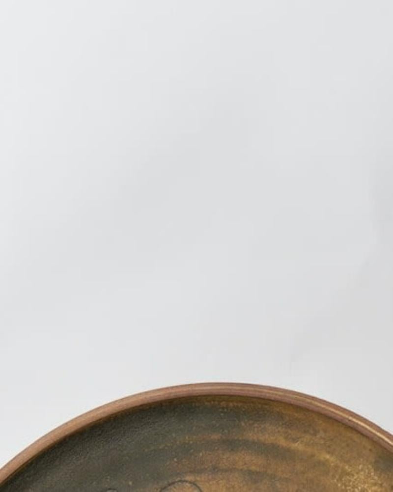 Terracota con pavo real inscrito
D38 cm