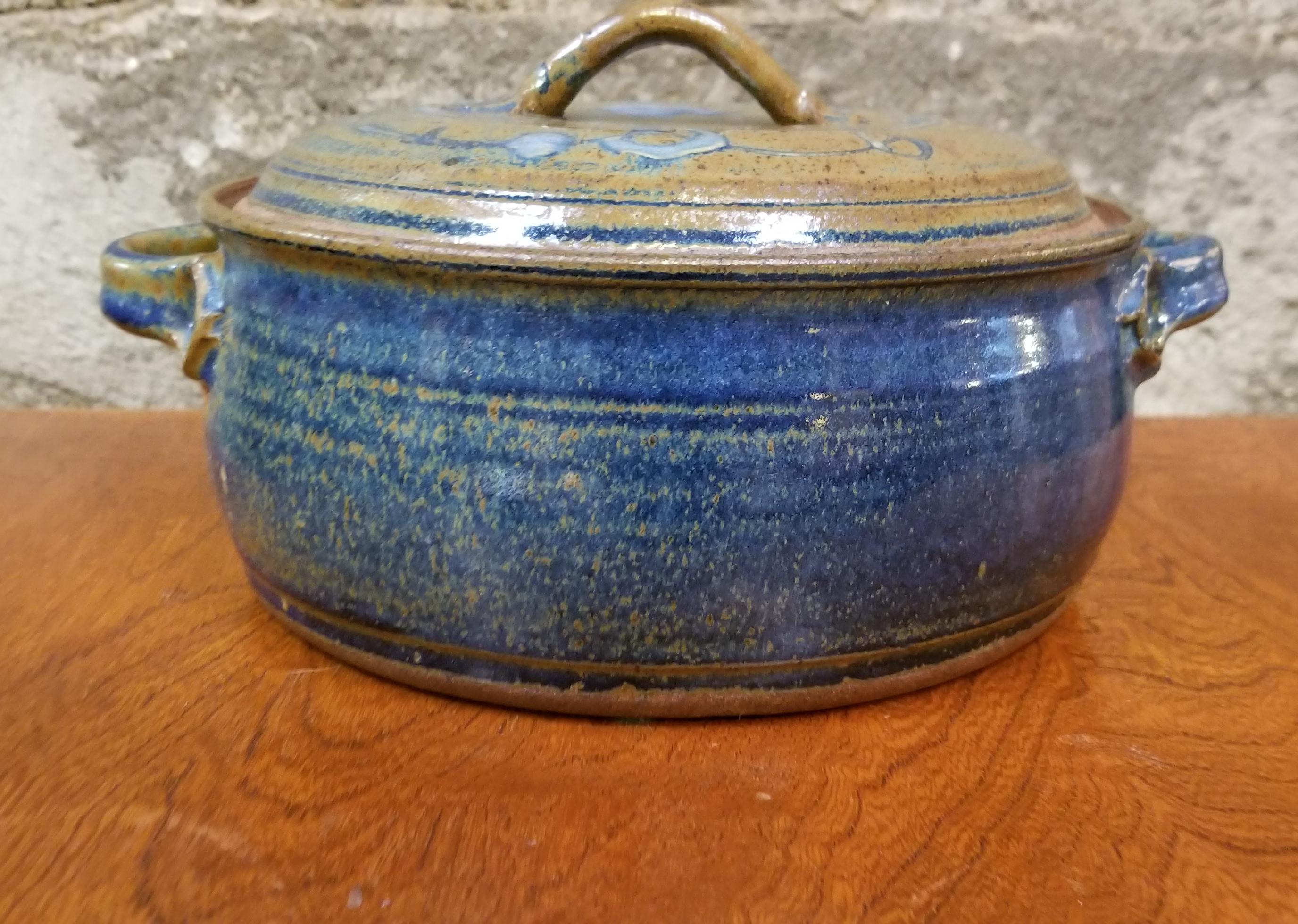 A Mid-Century Modern pottery lidded and handled pot or bowl by San Francisco artist Herman Roderick Volz. Signed on base. Abstract or drizzled textured glaze to lid.

Herman Roderick Volz
Painter, muralist, lithographer, set designer and