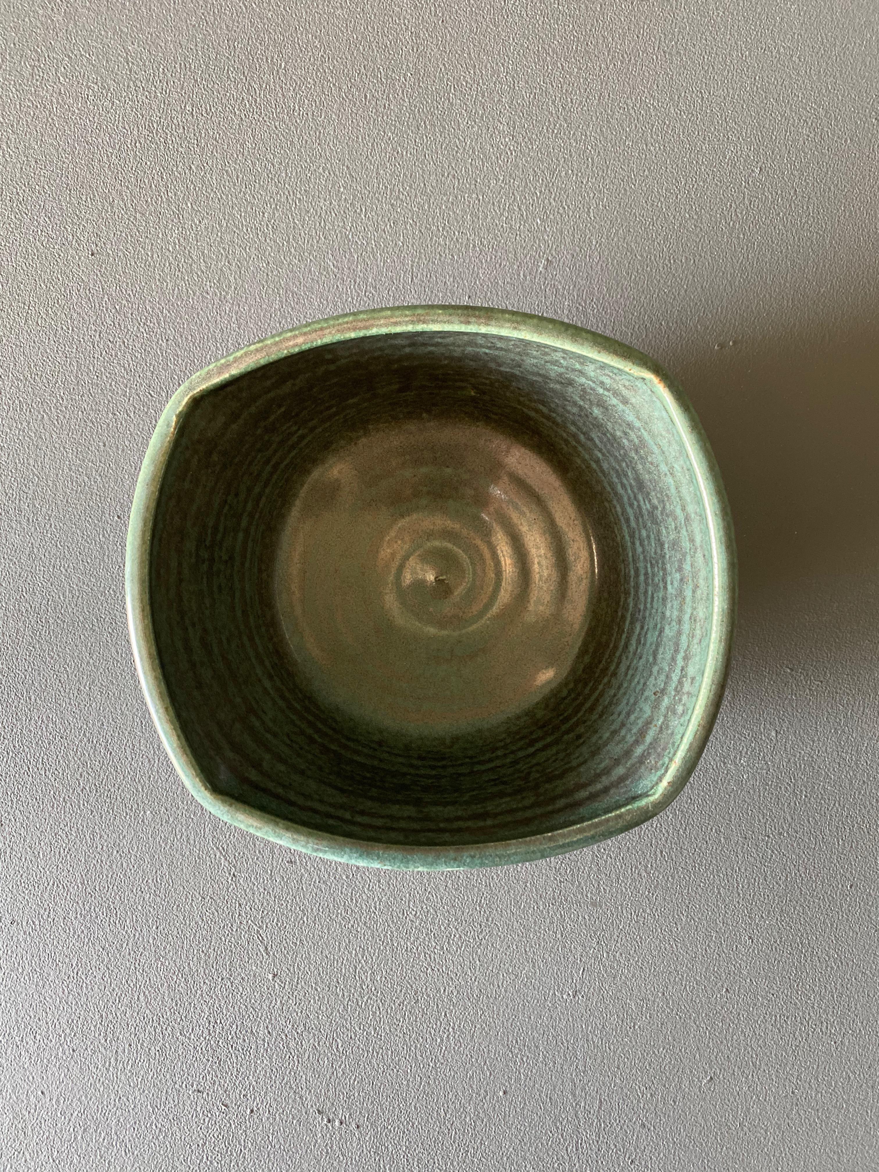 Studio pottery vessel / planter w/ green glaze. Signed.
