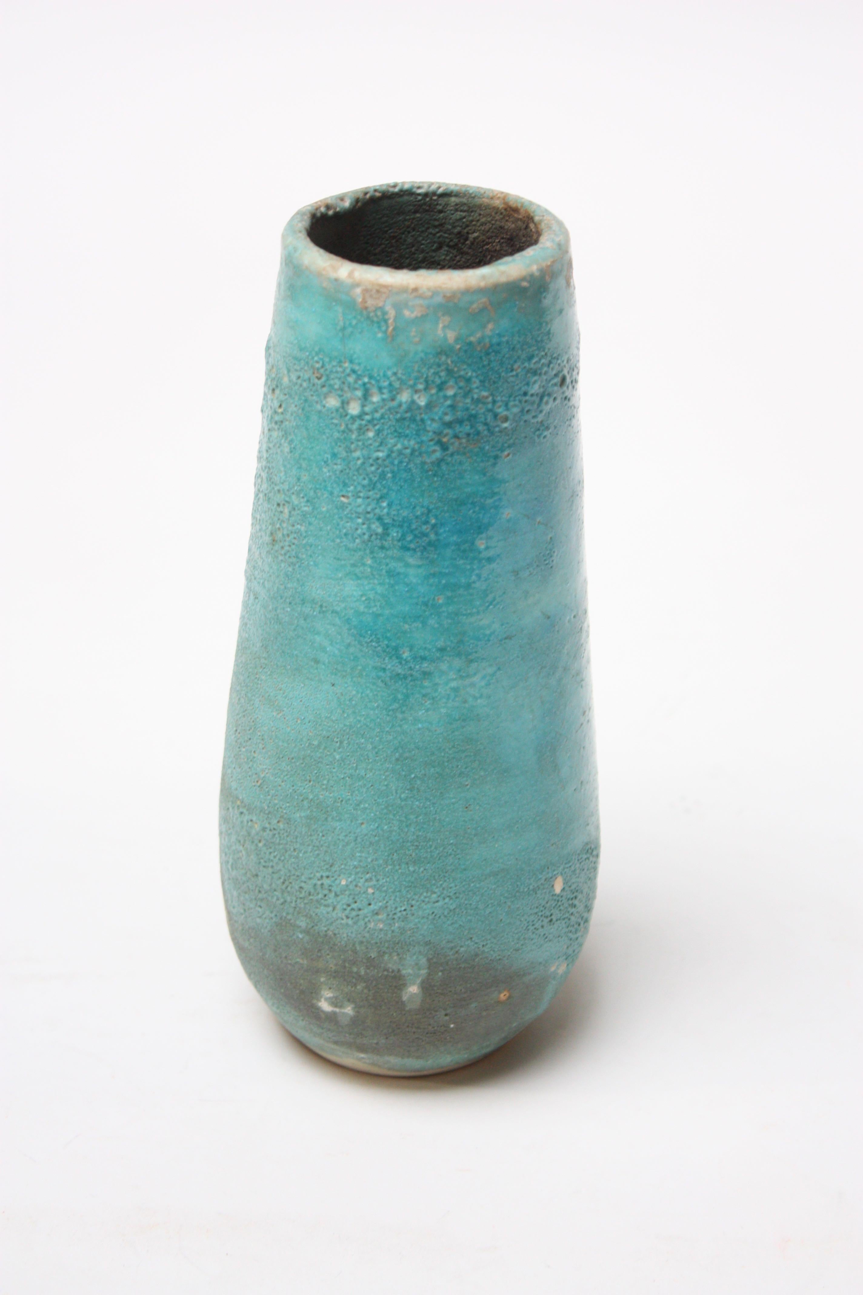 Small, intriguing Studio Pottery vase by Mark Keram in turquoise whose glaze has a volcanic-texture with bubbling throughout. Standard ink pen is used to illustrate scale. These is no loss / damage to the piece; the off-white applied speckling to