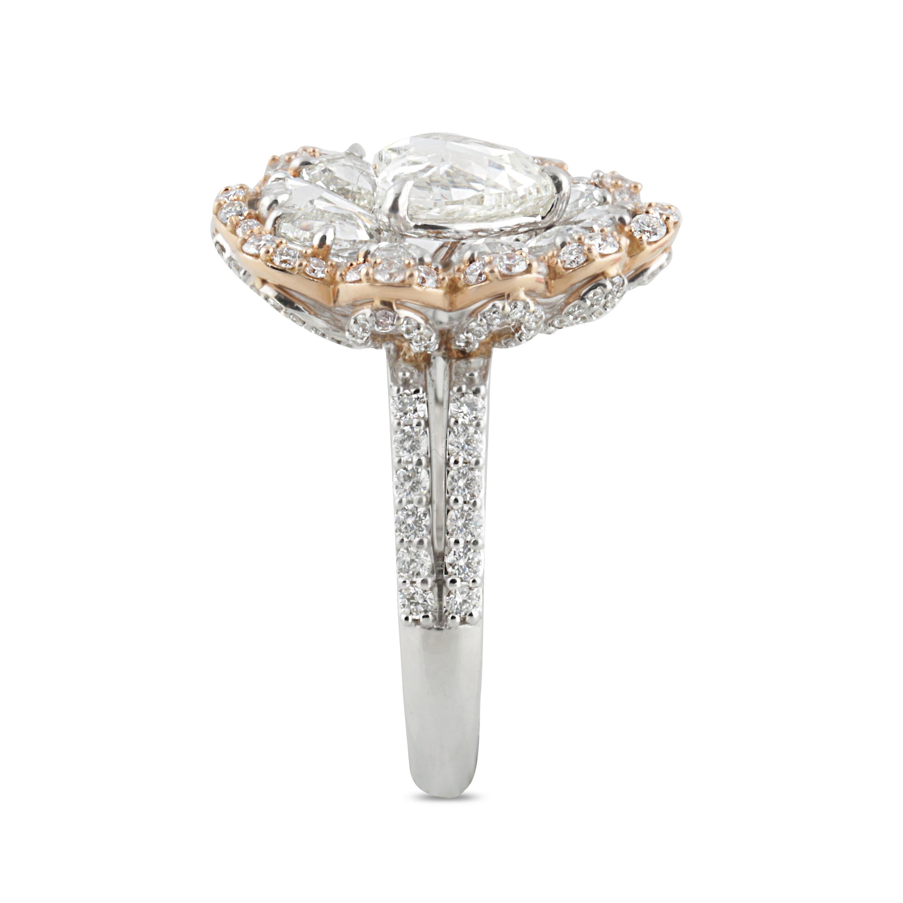 The timelessness of the design is what makes this 18K white and rose gold, floral-motif ring most enchanting. Adorned with brilliant cut and rosecut diamonds, this one-of-a-kind piece of jewellery is set gracefully using pavé and prong settings.
