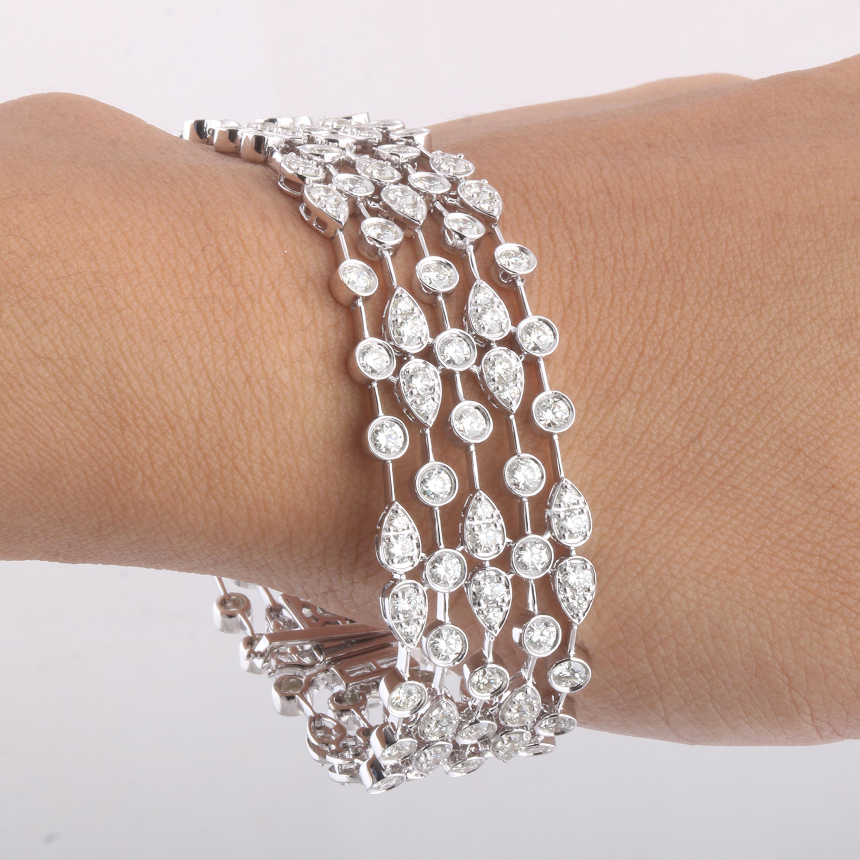 Gross Weight: 30.18 Grams
Diamond Weight: 10.32 cts
Size: 6.95 Inch (Lenght of Tennis Bracelet)
IGI Certification can be done on request.

Video of the product can be shared on request.

This modern-day bracelet is crafted using 14 Karat white gold