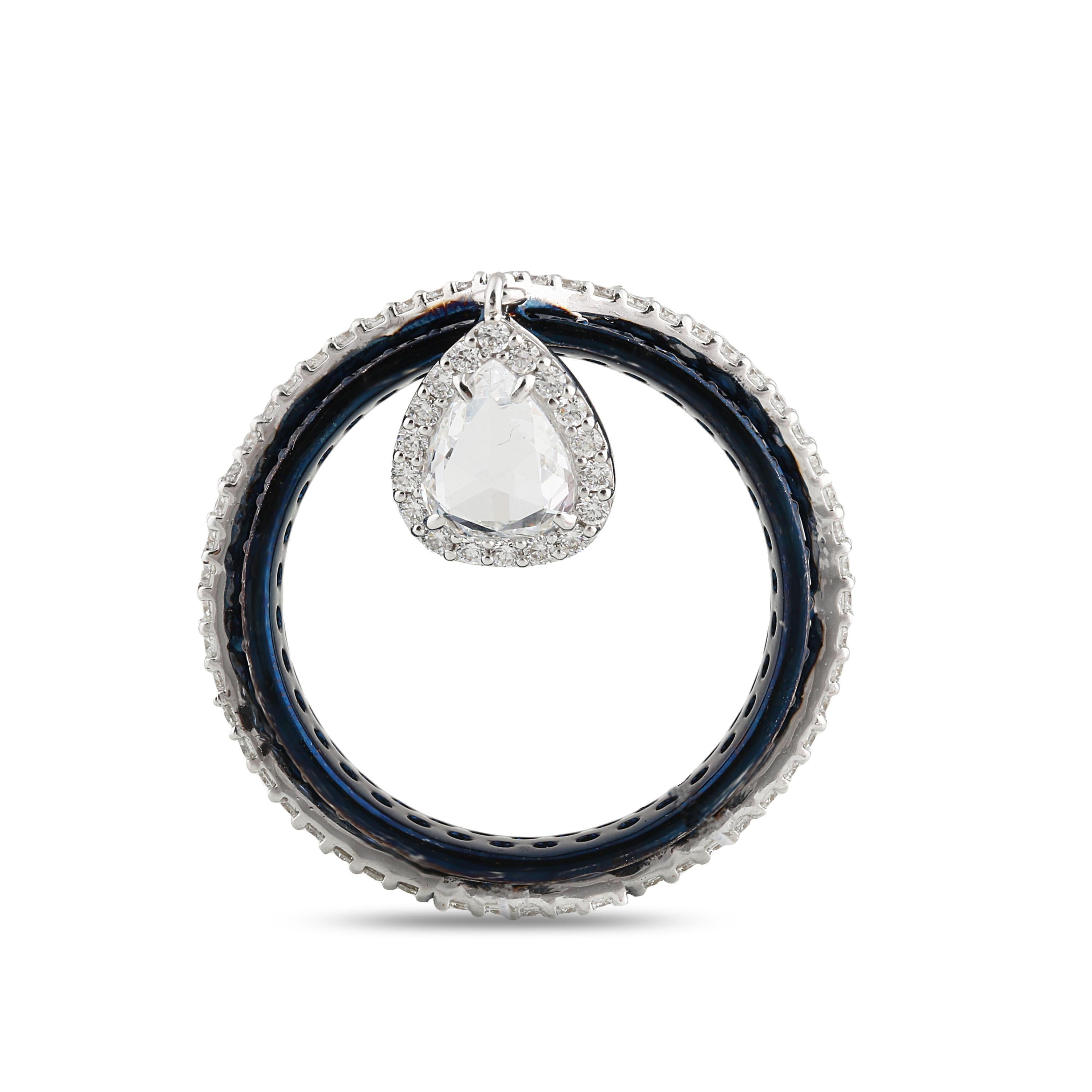 Versatility meets elegance in this 18K white gold ring featuring brilliant cut and rose cut diamonds and dazzling blue sapphires that is bound to enhance your look. Set beautifully in a mix of pavé and prong settings with a diamond drop detail, this