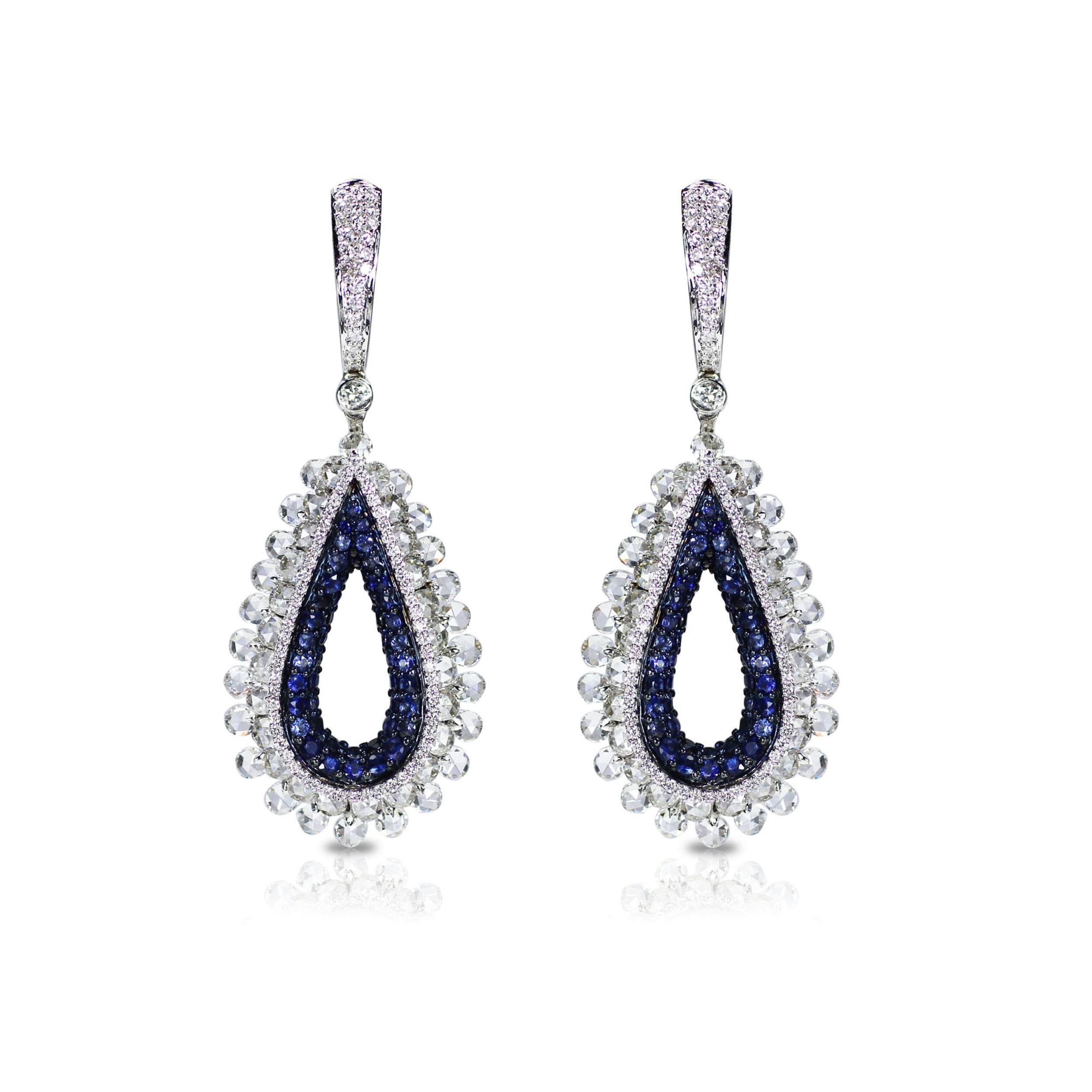 Brilliant cut and rosecut diamond and blue sapphire earrings

This teardrop-shaped pair of 18K white gold earrings featuring brilliant cut and rosecut diamonds will become a treasured part of your jewelry collection almost instantly. Adding charm to