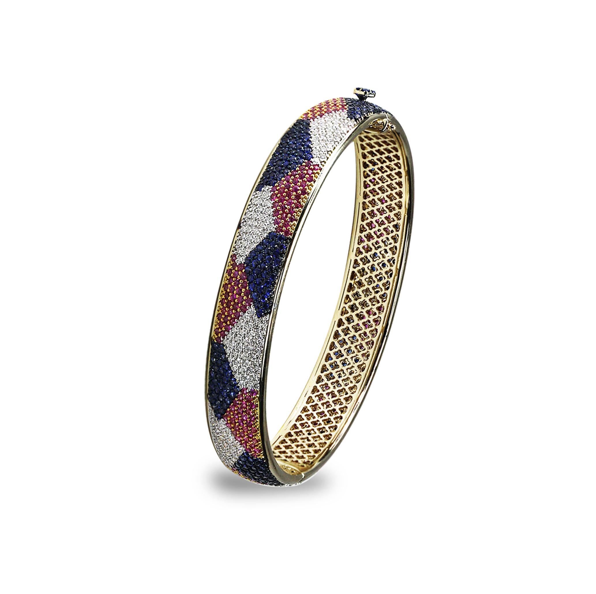 Blue and pink sapphires and diamond bracelet

Combining varying colours artfully is this 18K white gold slim bangle that brings together blue and pink sapphires juxtaposed with diamonds in a simple pave setting. While multi-hued, the piece is also