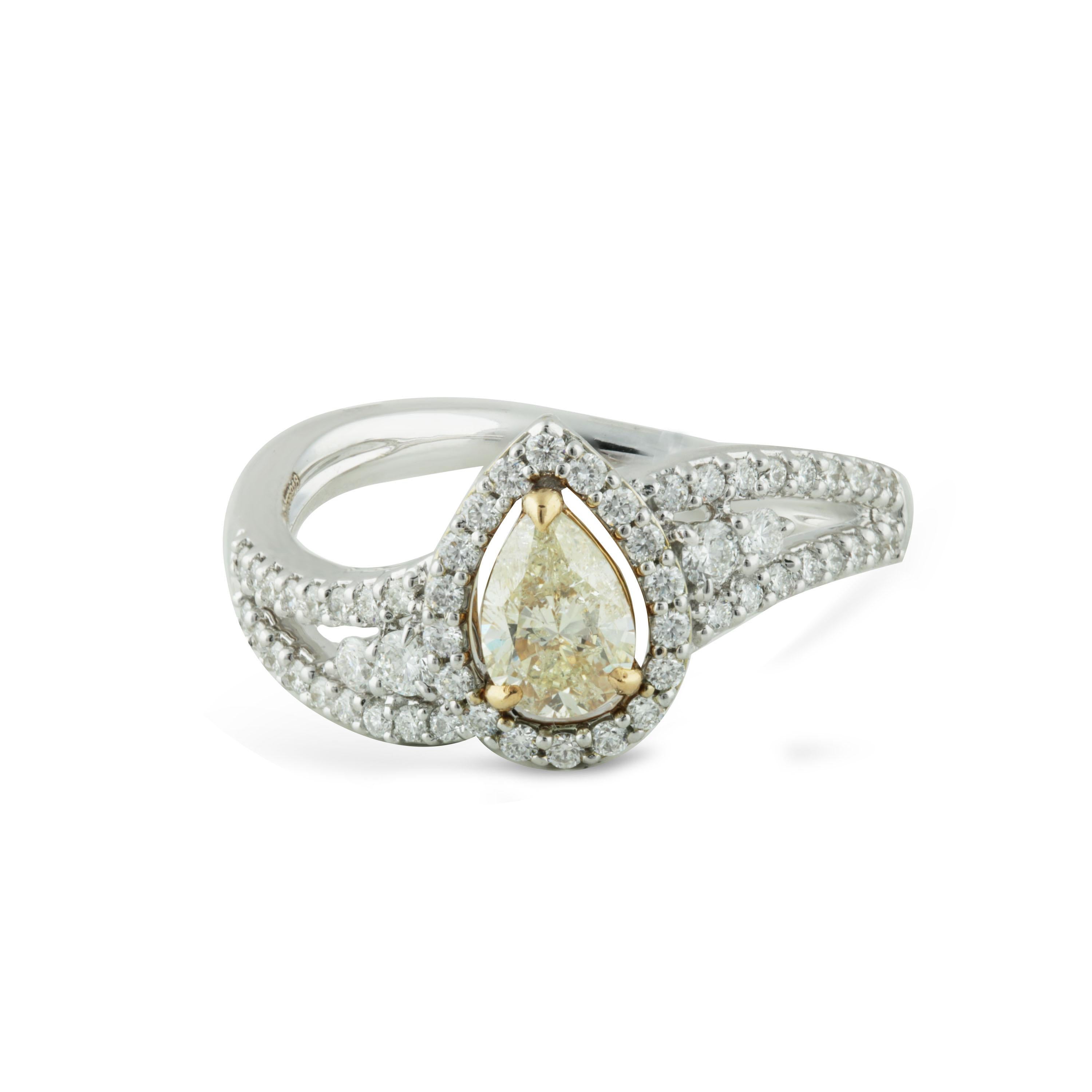 Yellow and white diamond ring

A pear-shaped yellow diamond is closely encased by round brilliant white diamonds in a prong setting on an 18K white and yellow gold base, giving this ring a nostalgic old Hollywood touch. Adorned with 57 stones, this