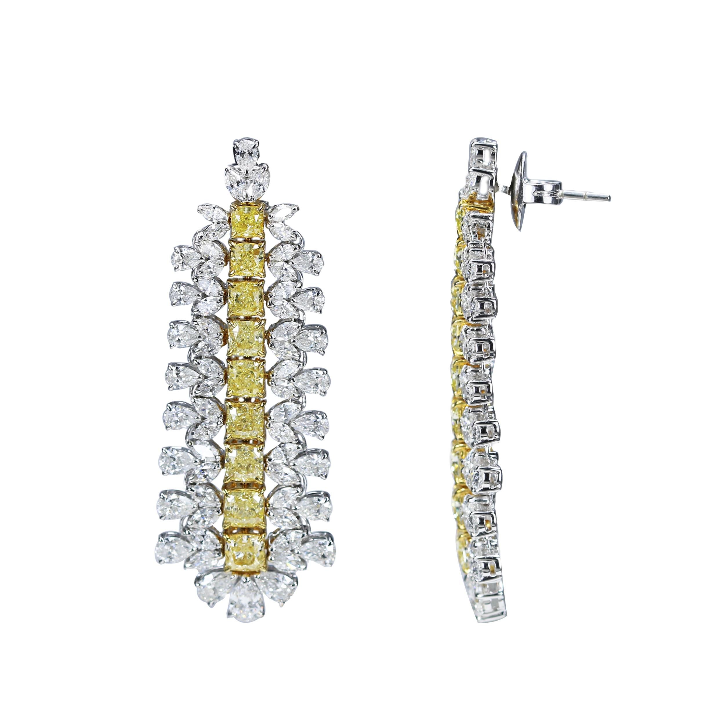 Yellow cushion cut diamonds and white diamonds earrings

These danglers with rare yellow cushion cut diamonds caged by pear and marquise shaped white diamonds are the epitome of regal charm. Handcrafted with 134 handpicked stones, they exude the