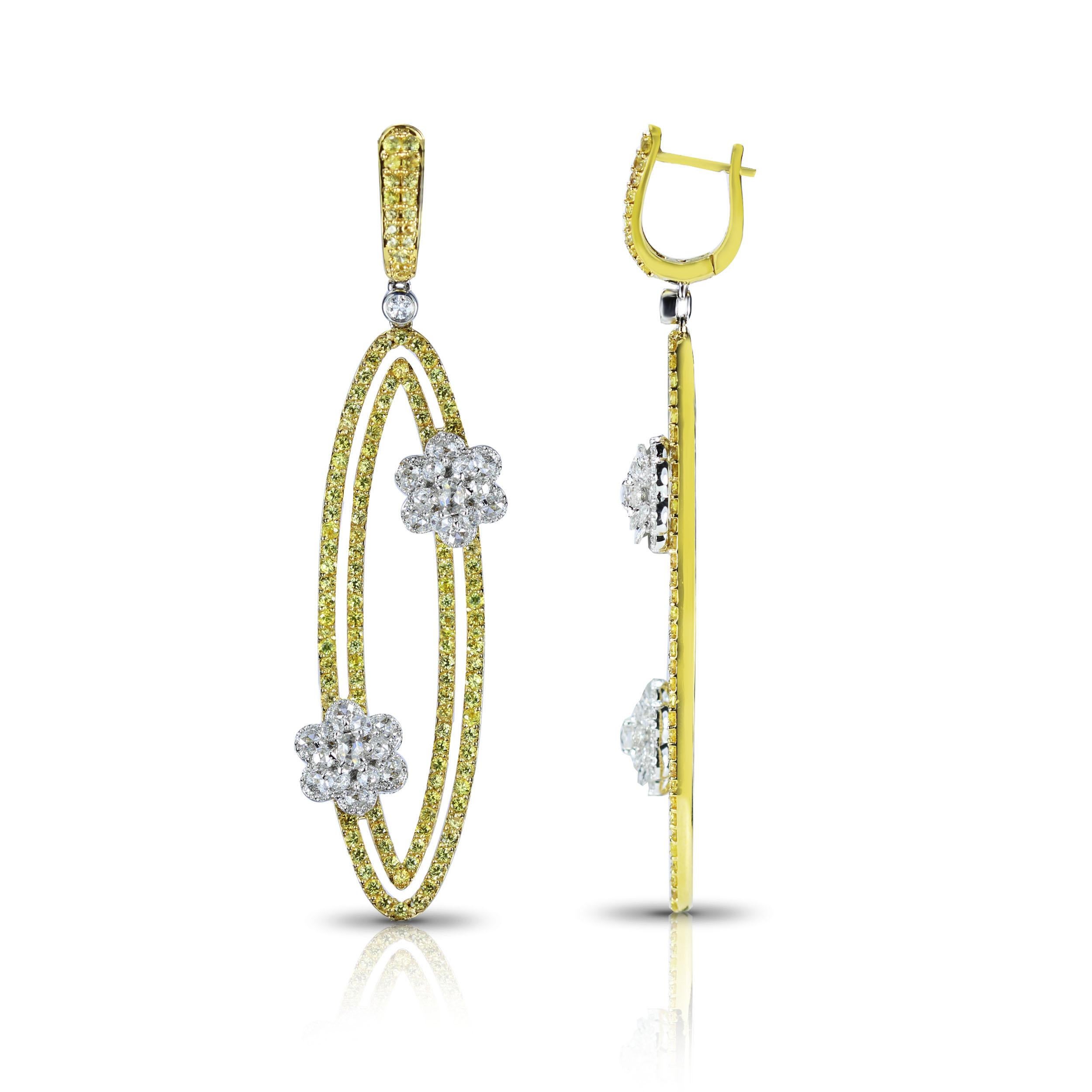 F-G/ VVS-VS-SI Diamond and Yellow Sapphire Earrings

Geometry and nature inspirations come together in these earrings that are one for the ages. Beaded yellow sapphires form oval loops that are brought together with floral motifs composed of round,