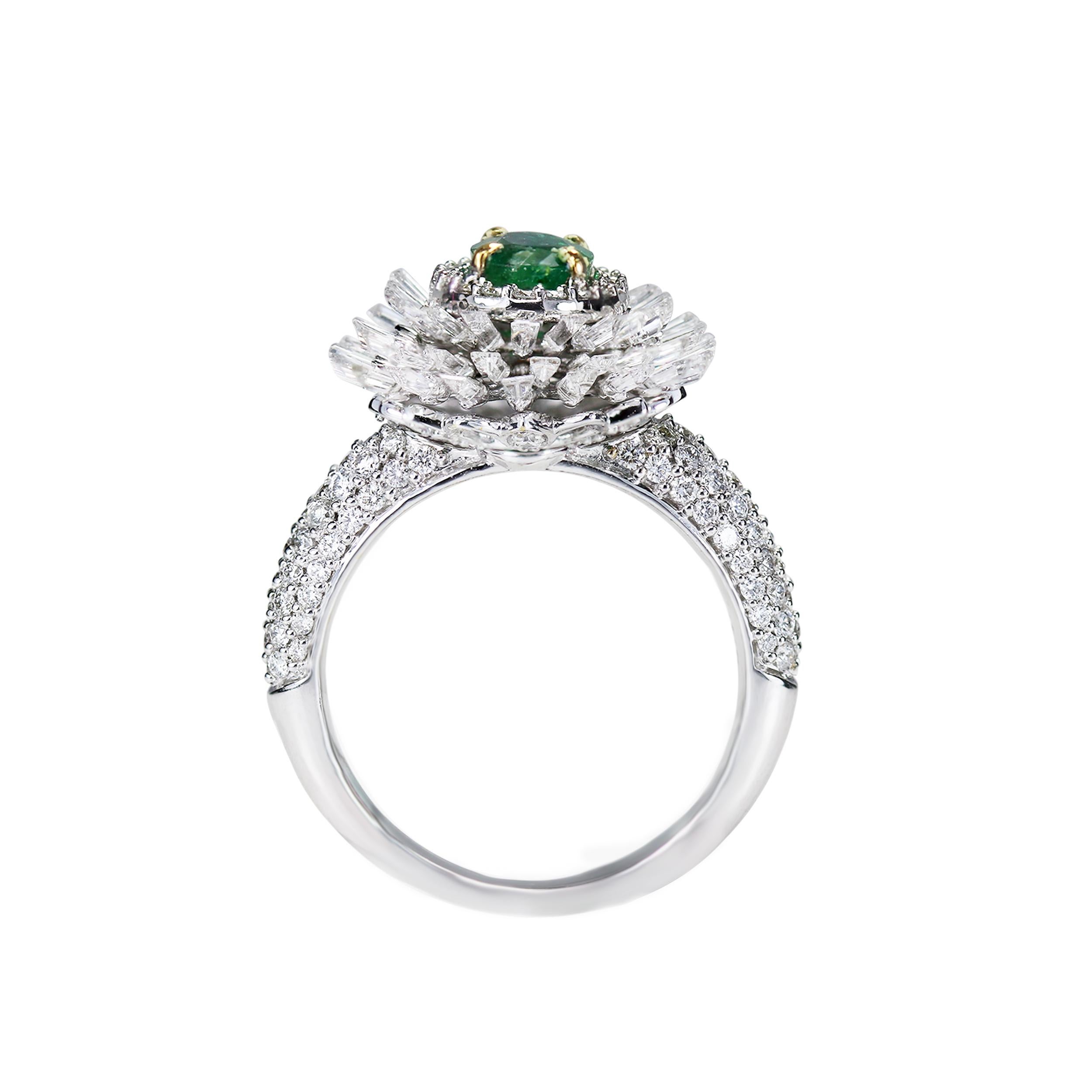 Diamond and emerald ring

A piece of jewellery that brightens up a room with its sparkle is worth owning. This 18K white gold ring studded generously with round and baguettes brilliant cut diamonds and a showstopping emerald is a must-have.