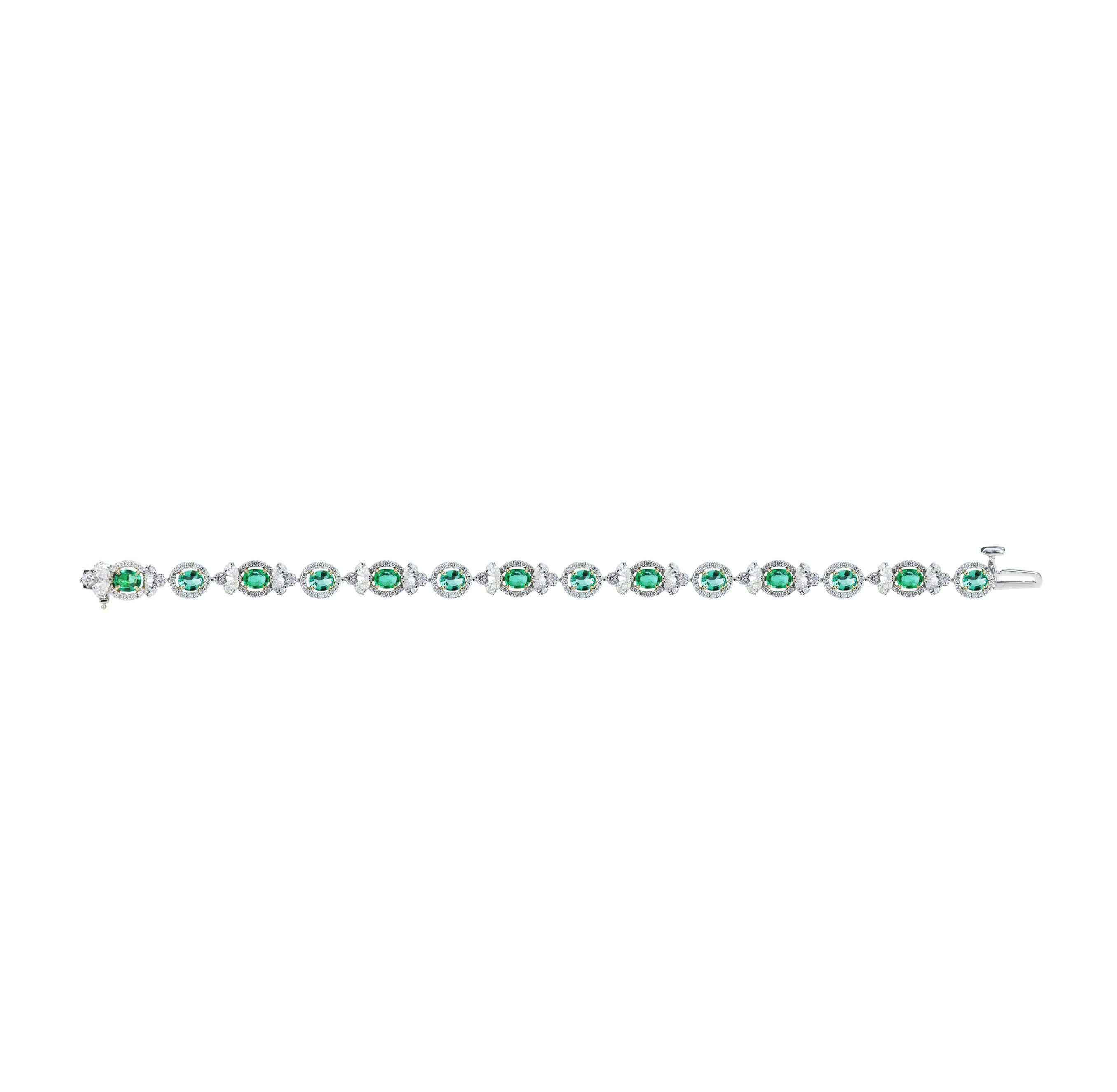 Diamond and emerald bracelet

A darling bracelet crafted using 18K white gold and studded with pear and round brilliant cut diamonds and emeralds, set in a prong setting is an heirloom-worthy collectible. This is the kind of design that will become
