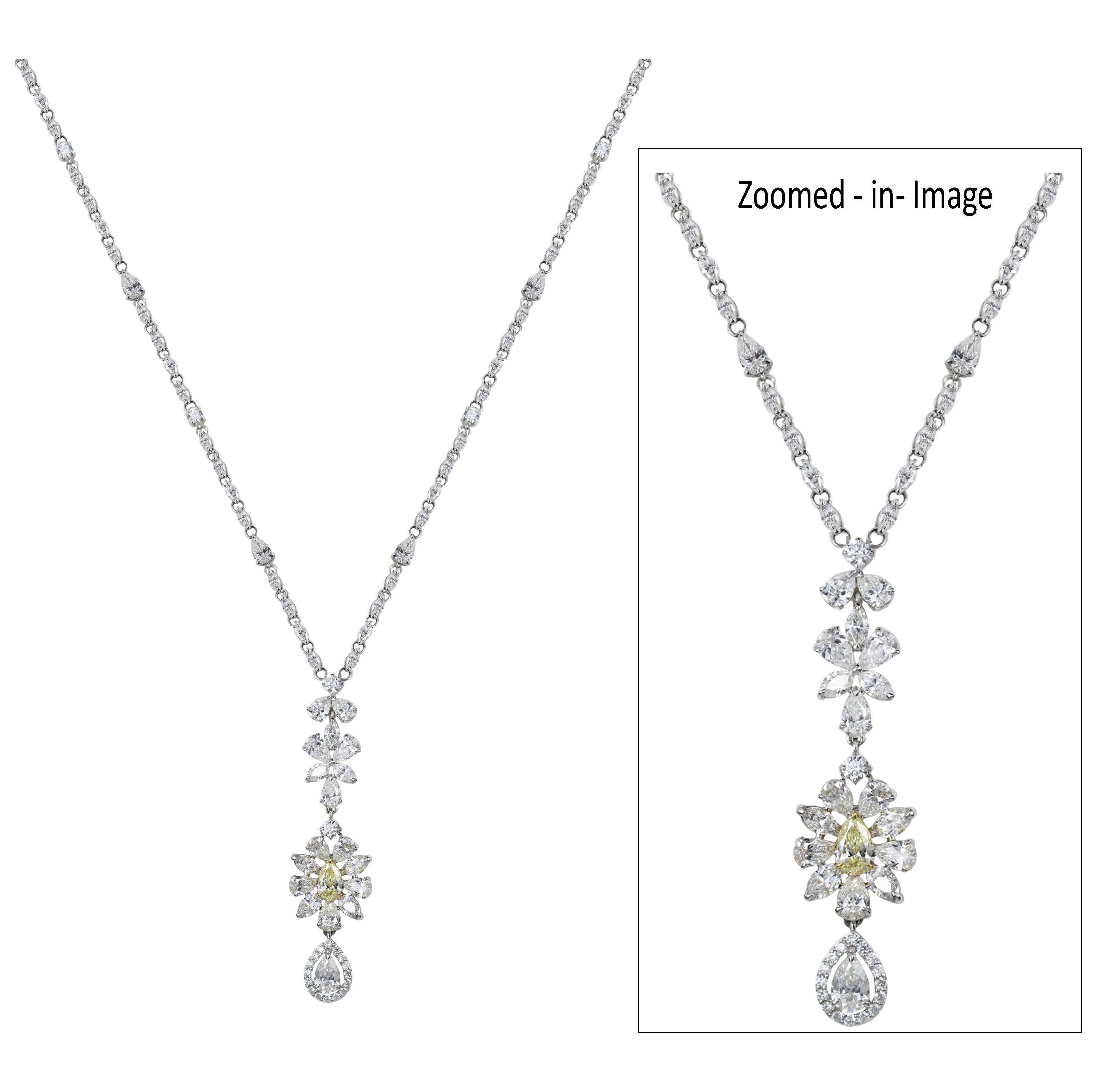 White and yellow diamond necklace

With its nuanced design, this 18K white and yellow gold necklace studded marquise, pear, round brilliant cut white and yellow diamonds will appeal to sophisticated sensibilities. Each of the 171 stones have been
