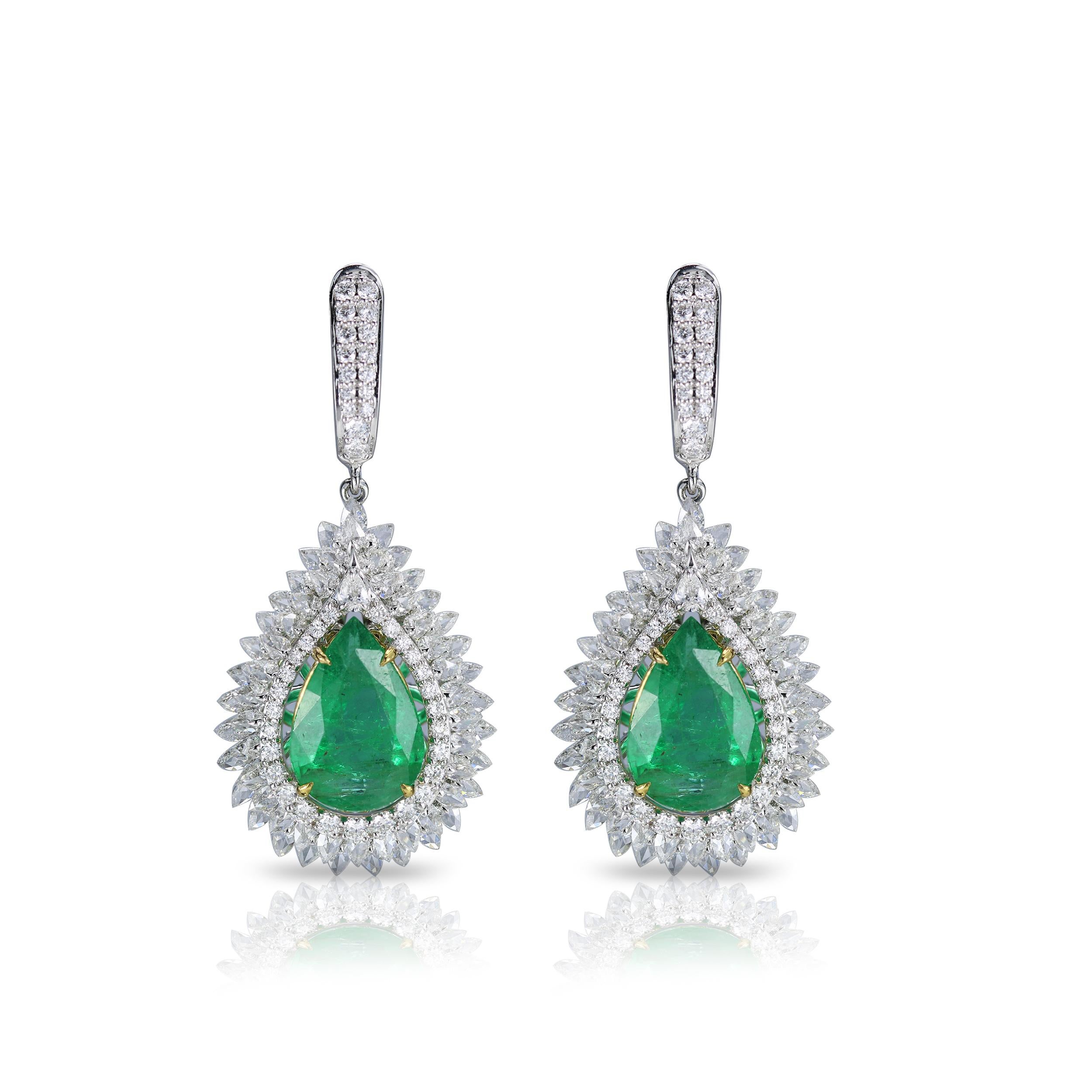 Diamond and emerald earrings

Strong style statements are carefully curated, and with this pair of 18K white gold earrings featuring pear and round rosecut and round brilliant cut diamonds and emeralds set in a prong and drill setting you can