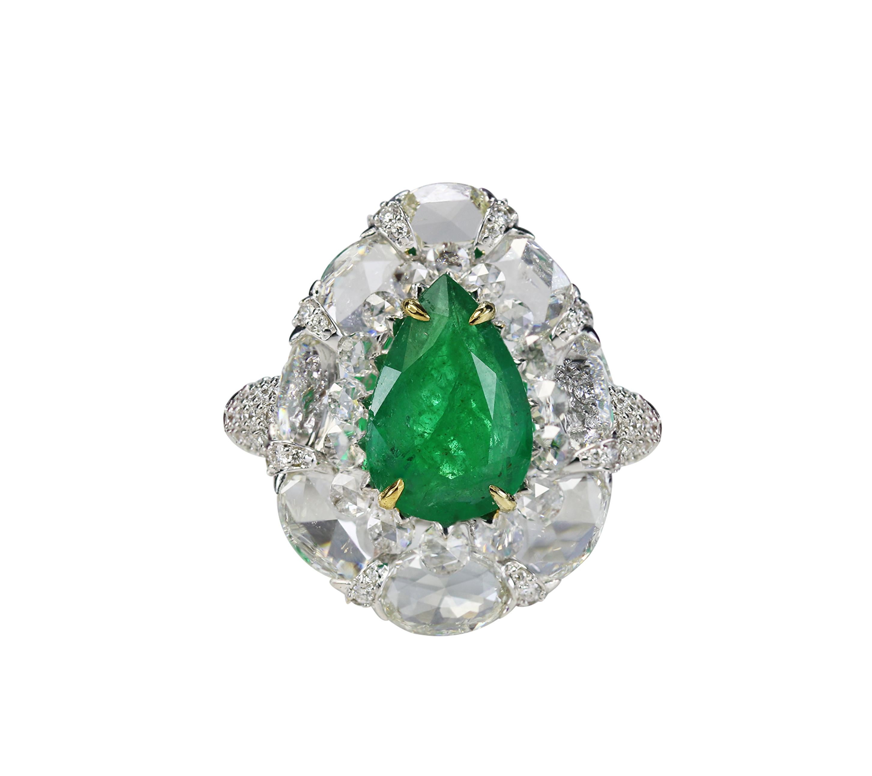 Diamond and emerald ring

Give your repertoire a glorious burst of colour with this 18K white gold ring adorned with round and oval rose cut and round brilliant cut diamonds and a drop-shaped emerald. Studded with 137 stones in a prong, drill and