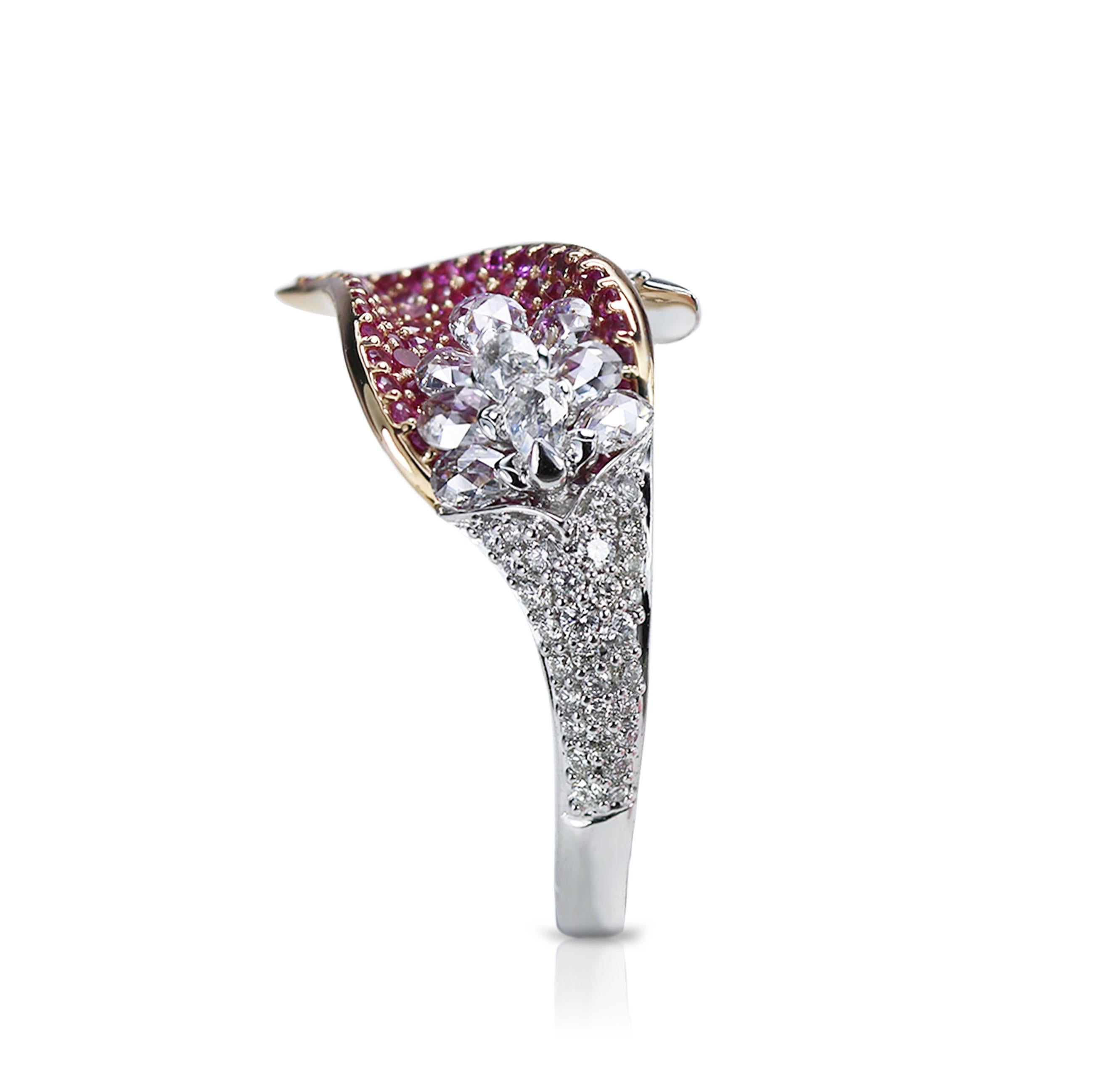 F-G-H/ VVS-VS-SI Diamond and pink sapphire ring

The design of this cocktail ring is a lesson in superior artistry. Handcrafted with F-G-H/ VVS-VS-SI pear rosecut and round brilliant cut diamonds alongside luminescent pink sapphires, it boasts a