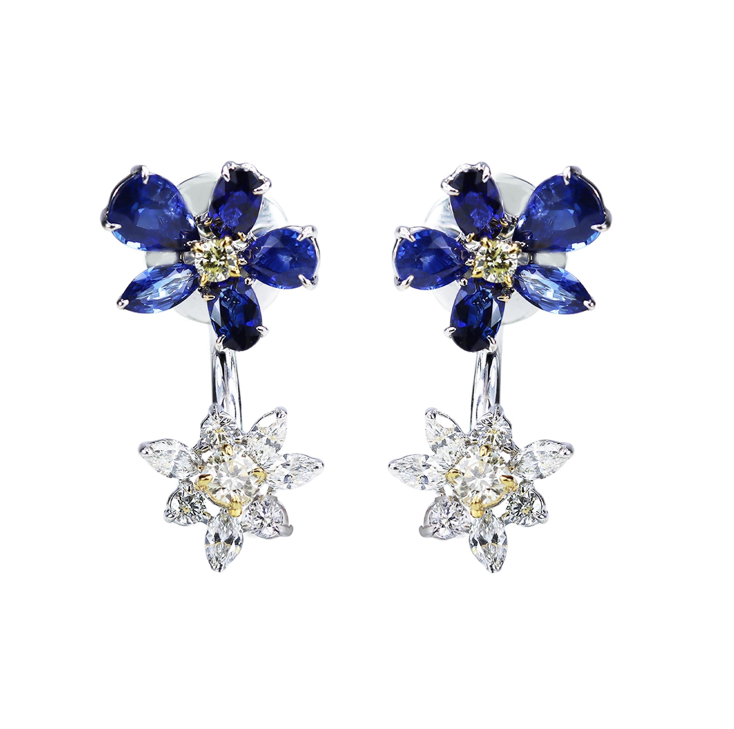 F-G/ VS-SI White and yellow diamonds, and blue sapphire earrings

We pay an ode to the timelessness of flowers but give it an unconventional update with these scintillating round and marquise full cut white and yellow diamond earrings which are