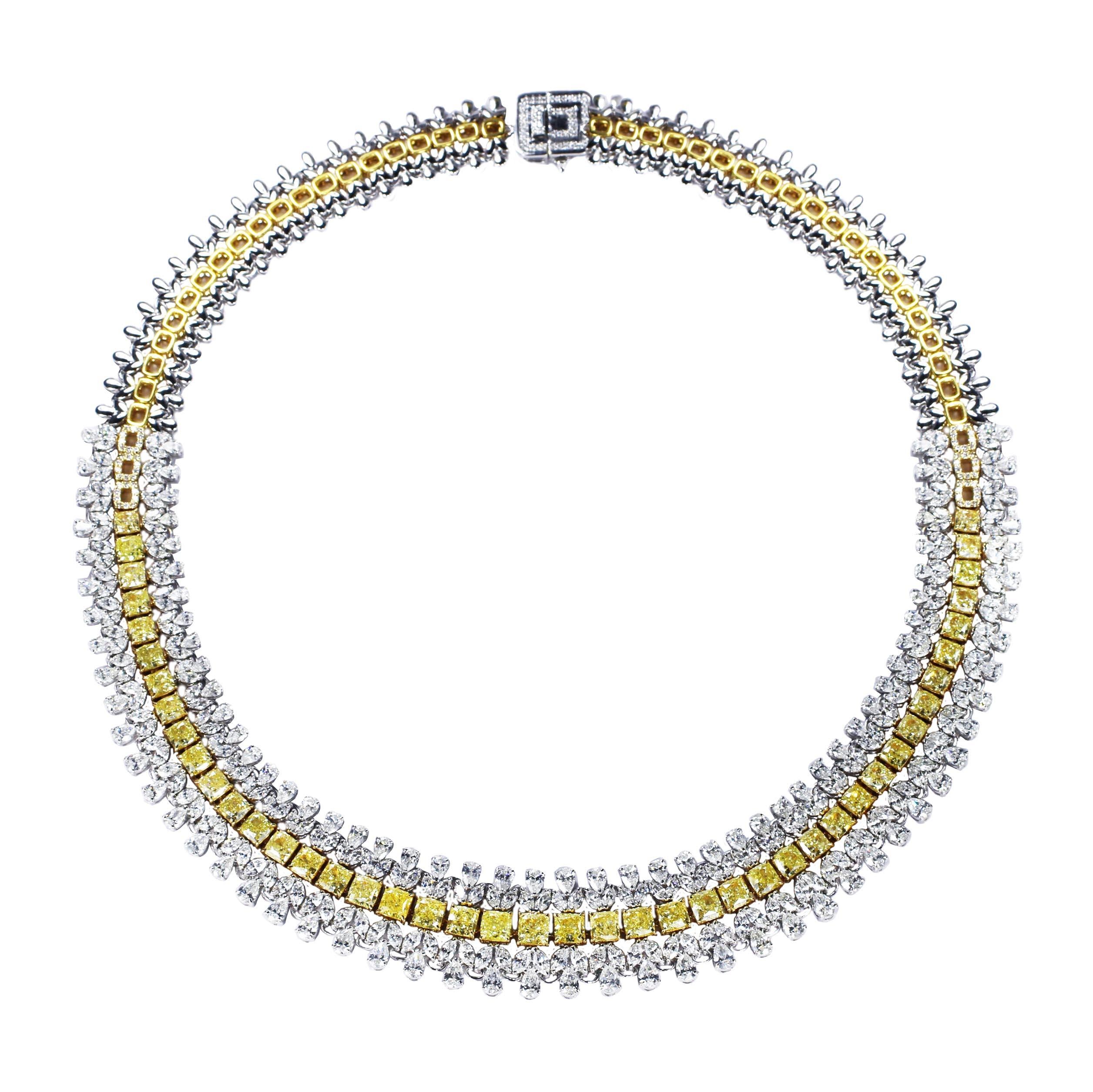 Yellow Cushion cut Diamonds and White Diamonds Necklace

This necklace set in 18K white and yellow gold captures the sumptuous shades of the sun with handpicked rare cushion cut yellow diamonds, beautifully enhanced with pristine white pears and