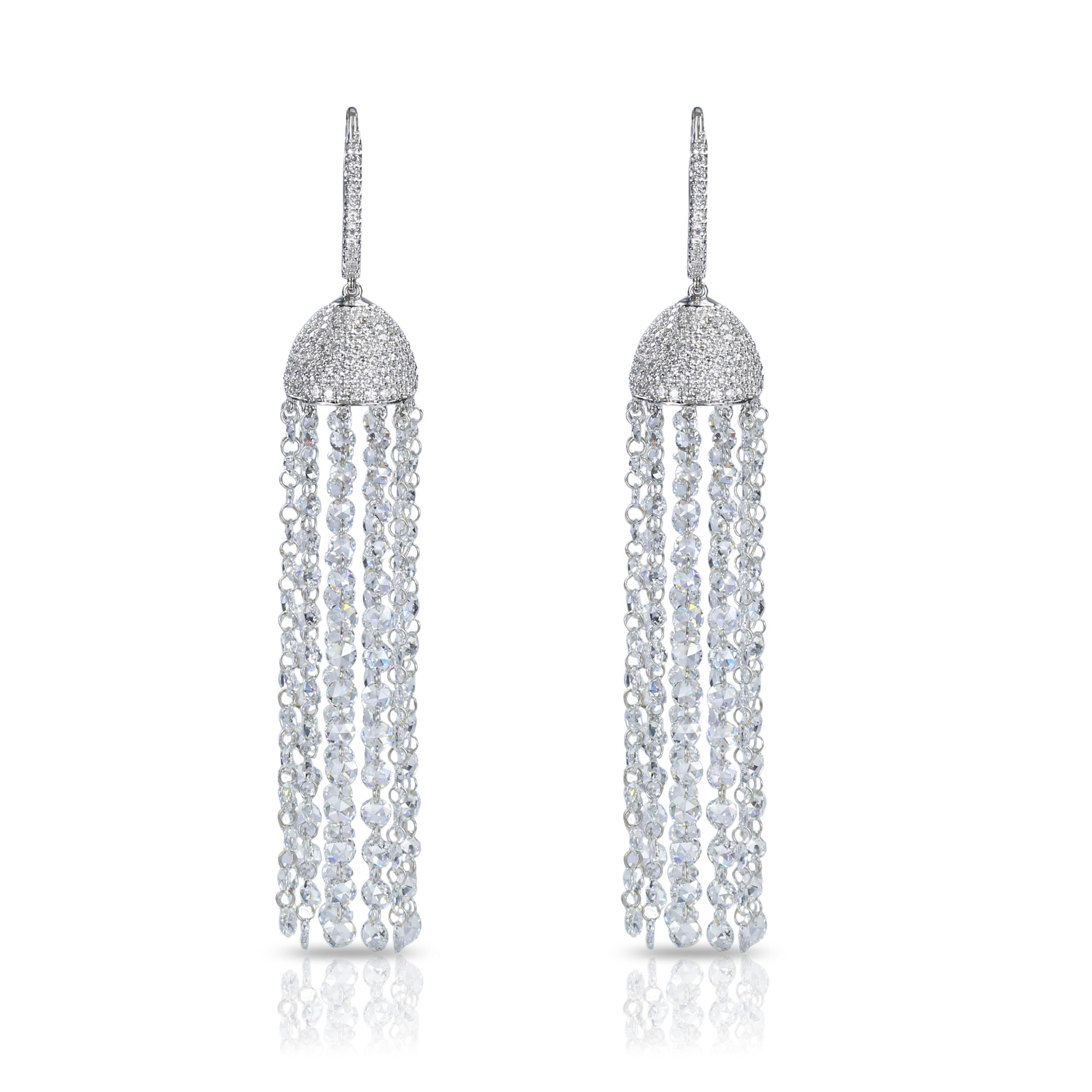 F-G-H/ VS-SI Brilliant cut and Rosecut Diamond Dangling Earrings

Indulge in the extravaganza that is this pair of 18K white gold danglers. The dome fashioned from brilliant cut diamonds complemented by a cascading waterfall of delicate rosecut