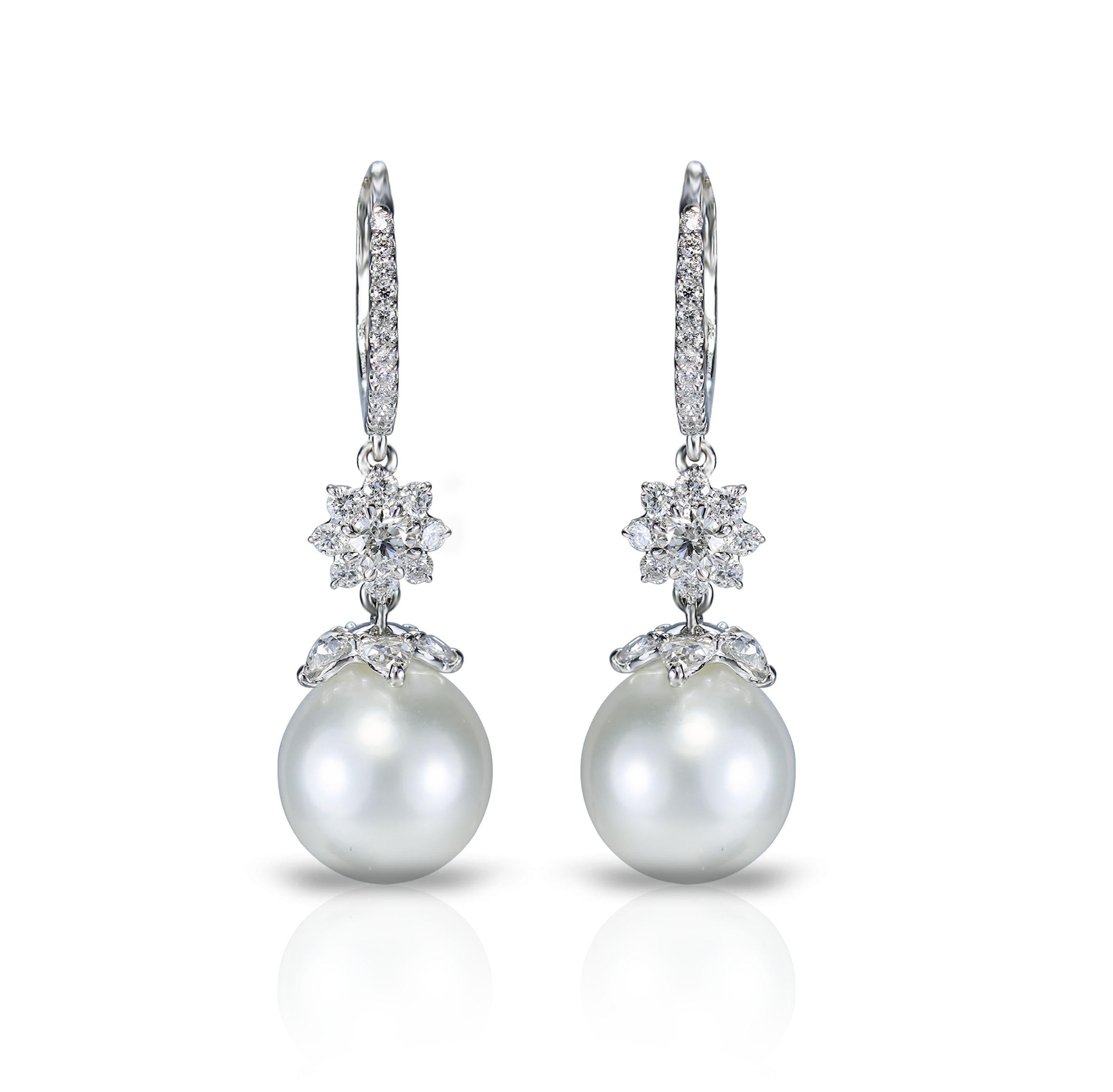 Diamond and south sea pearl earrings

Vintage sensibilities have a distinct charm as is illustrated by this pair of 18K white gold earrings featuring pear rosecut and round brilliant cut diamonds and classic south sea pearls.  Though understated,