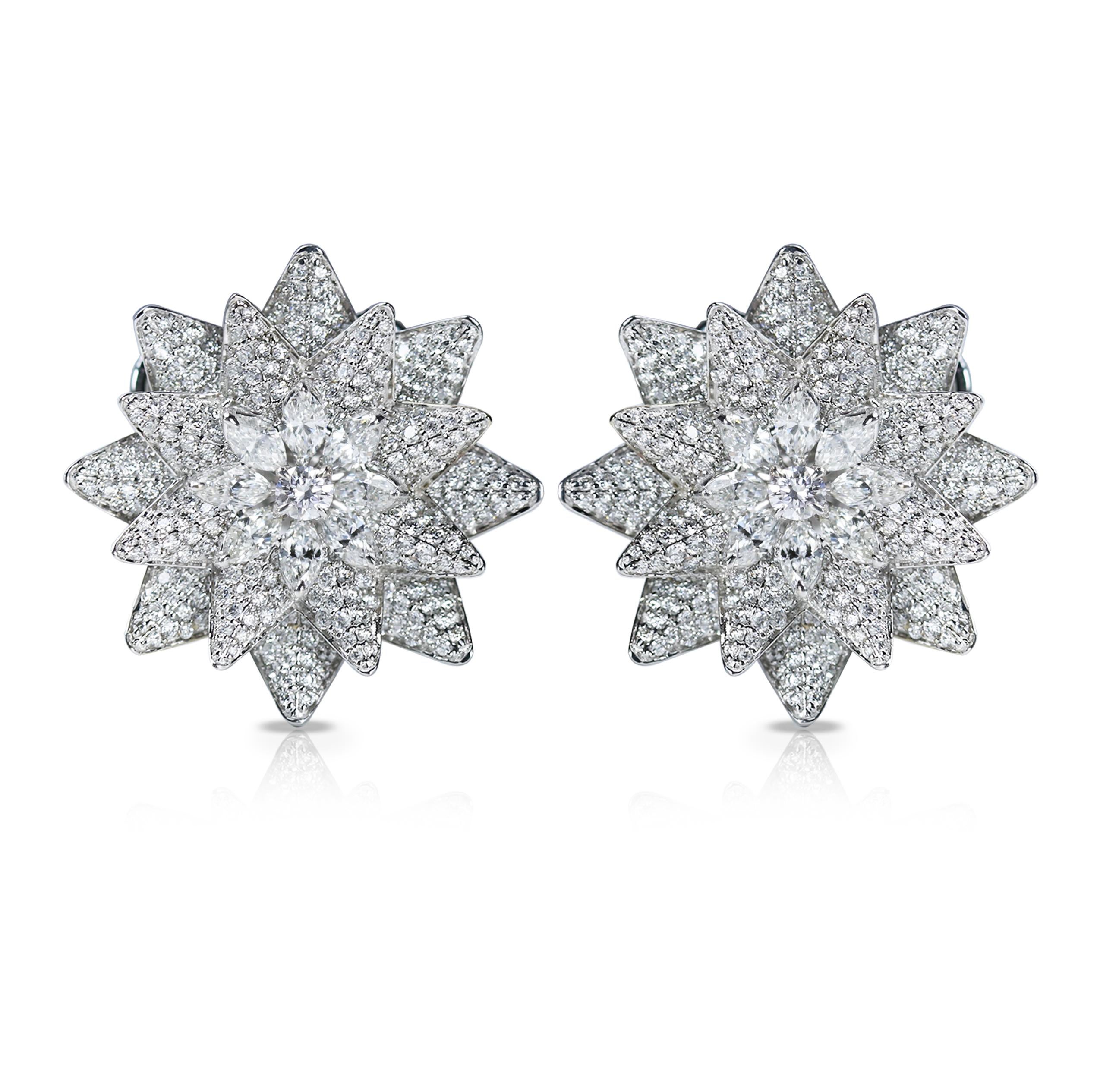 G-H/ VS-SI brilliant cut diamond earrings

An exemplary floral arrangement takes centre stage in this arresting pair of 18K white gold earrings adorned with G-H/ VS-SI brilliant cut diamonds. Such is the design that the pair is a keepsake in a