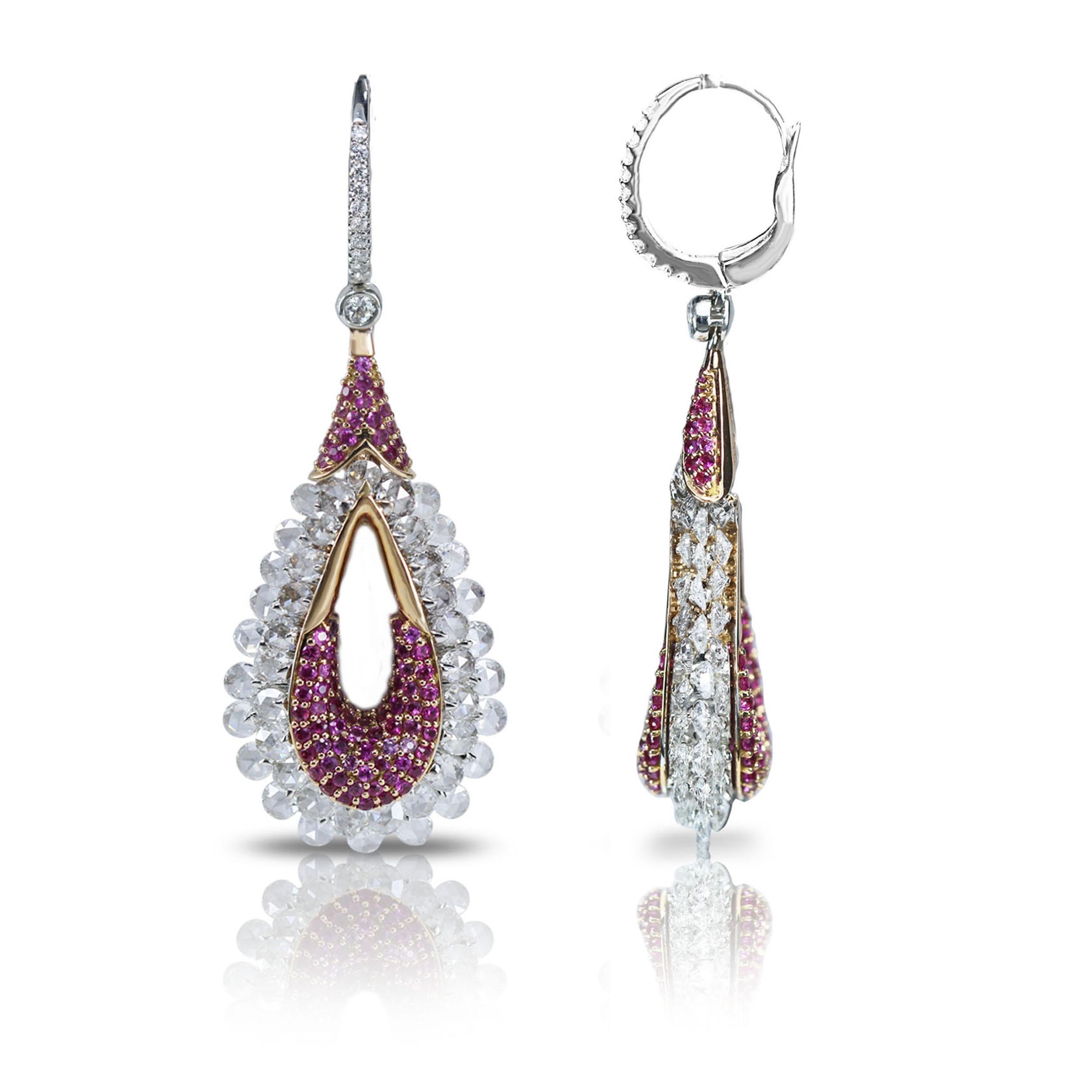 F-G/ VS-SI brilliant and rosecut diamonds and pink sapphire earrings 

The contrast of the vivid pink sapphires cased by luminous rosecut diamonds lends these danglers a glorious afterglow. The 18K white gold base, further punctuated with brilliant