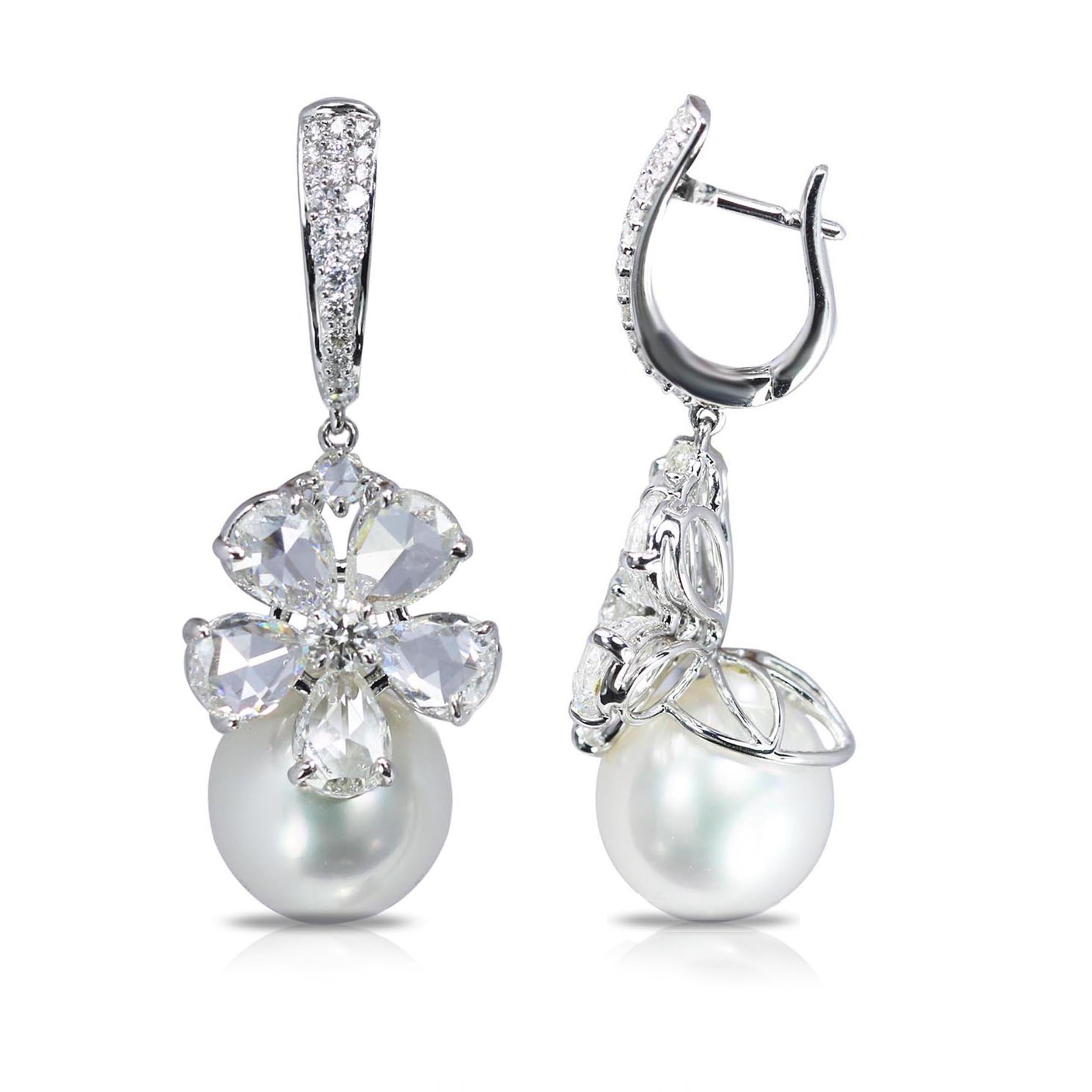 G-H/ VS-SI brilliant cut and rosecut diamonds and south sea pearl earring

This 18K white gold pair of drop earrings crafted in G-H color VS-SI brilliant cut and rosecut diamonds champions the ‘less is more’ aesthetic. Giving the classic floral